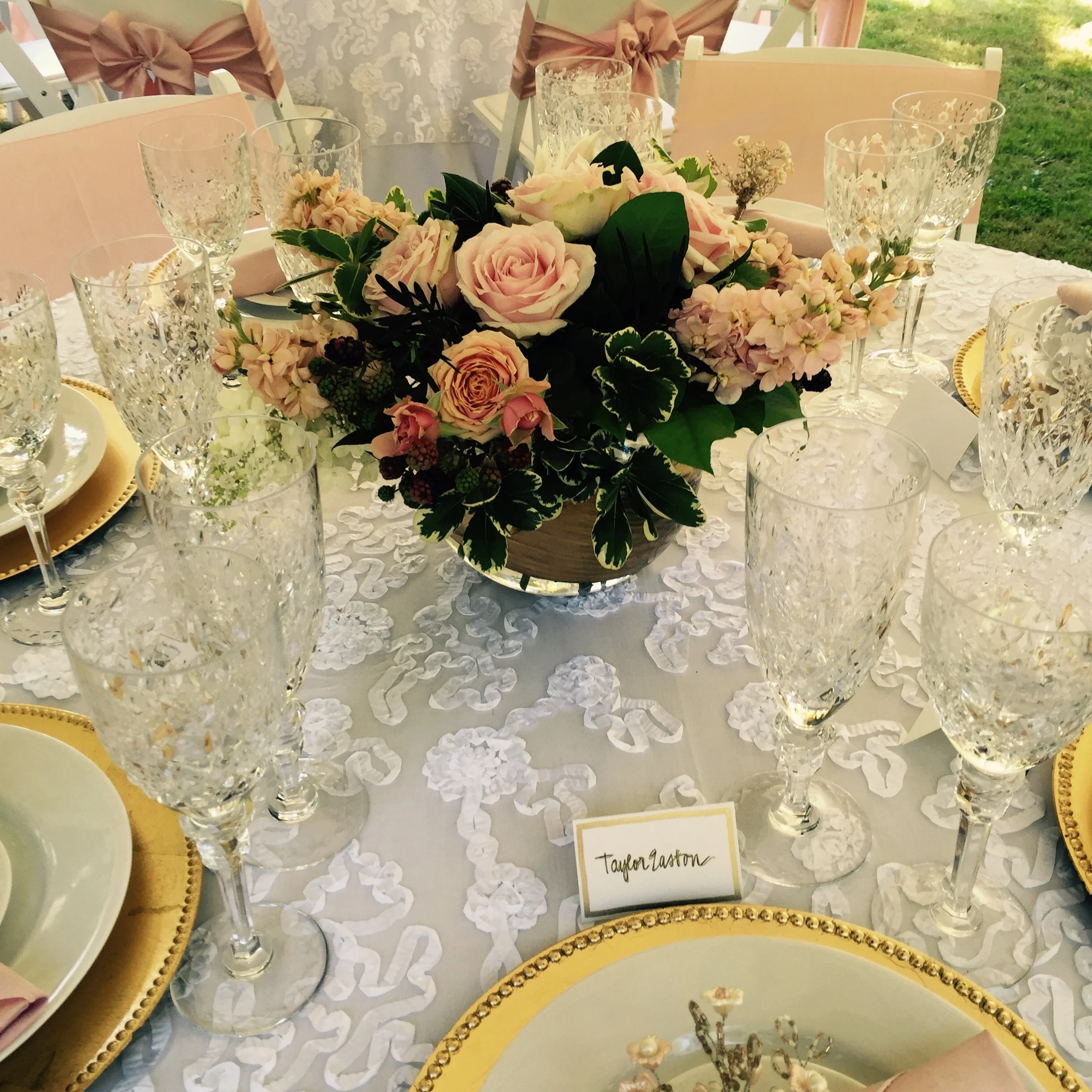 Blush centerpiece with hydrangeas, dahlias, stock, roses and gold accent