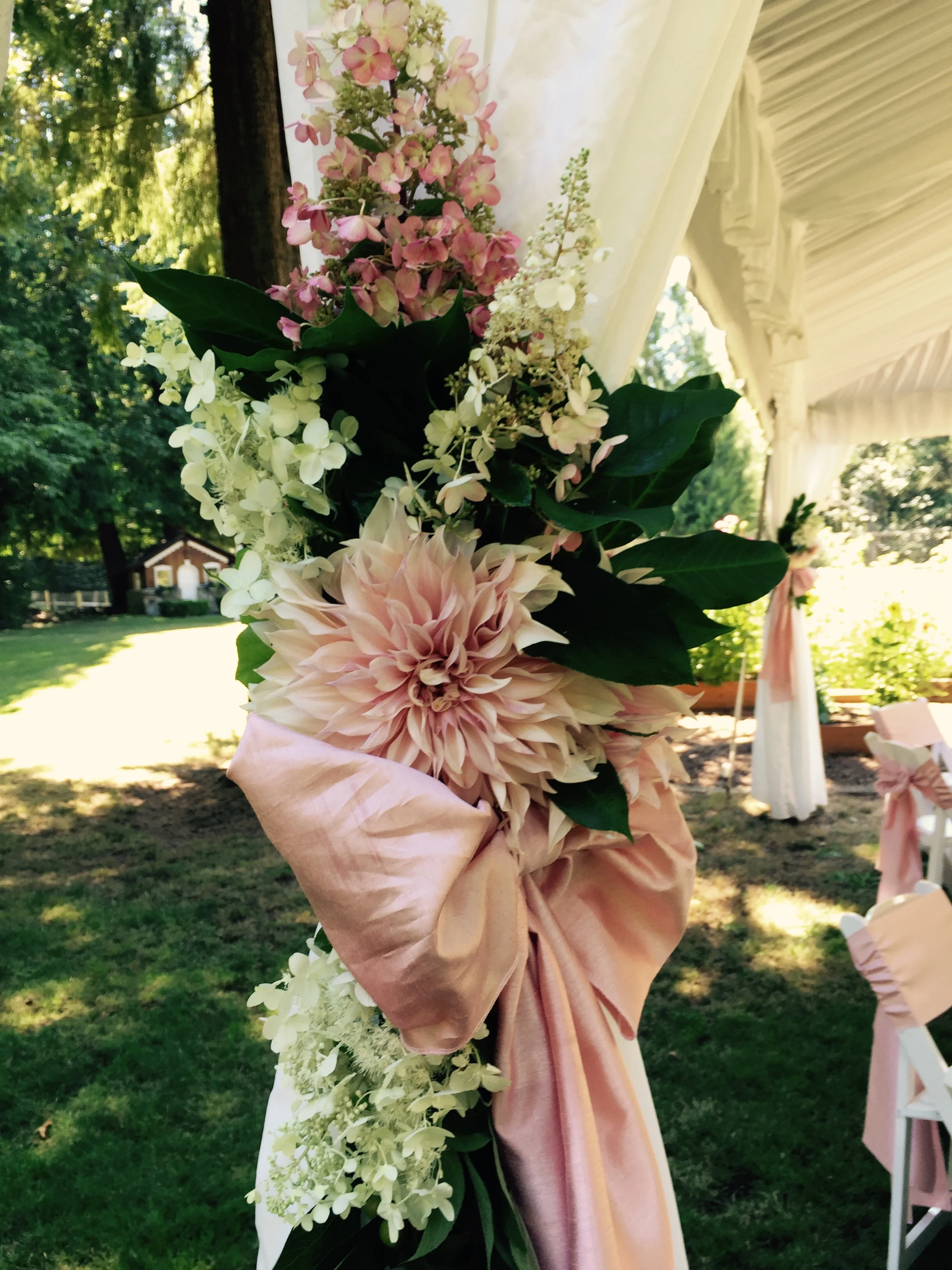 Blush tent tie-back with Cafe au Lait dahlias