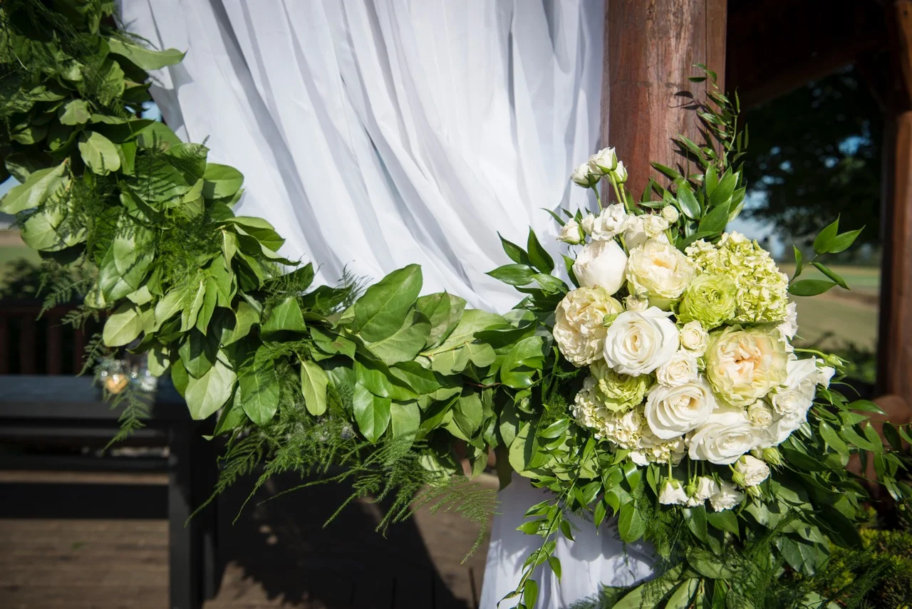 Green garland tieback. White flowers, roses, hydrangeas