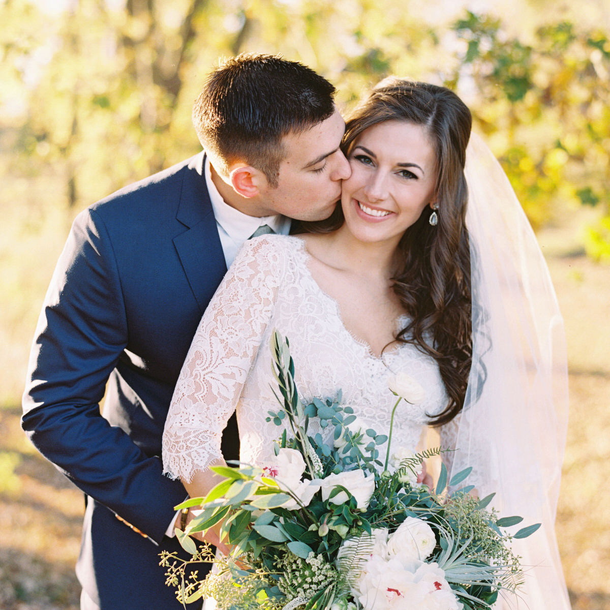 Working with Lisa was an absolute joy! She made us feel completely comfortable and at ease throughout the entire process. We are thrilled with our photos from our wedding and will be forever thankful to her for capturing our day! - Brittany Haggaman