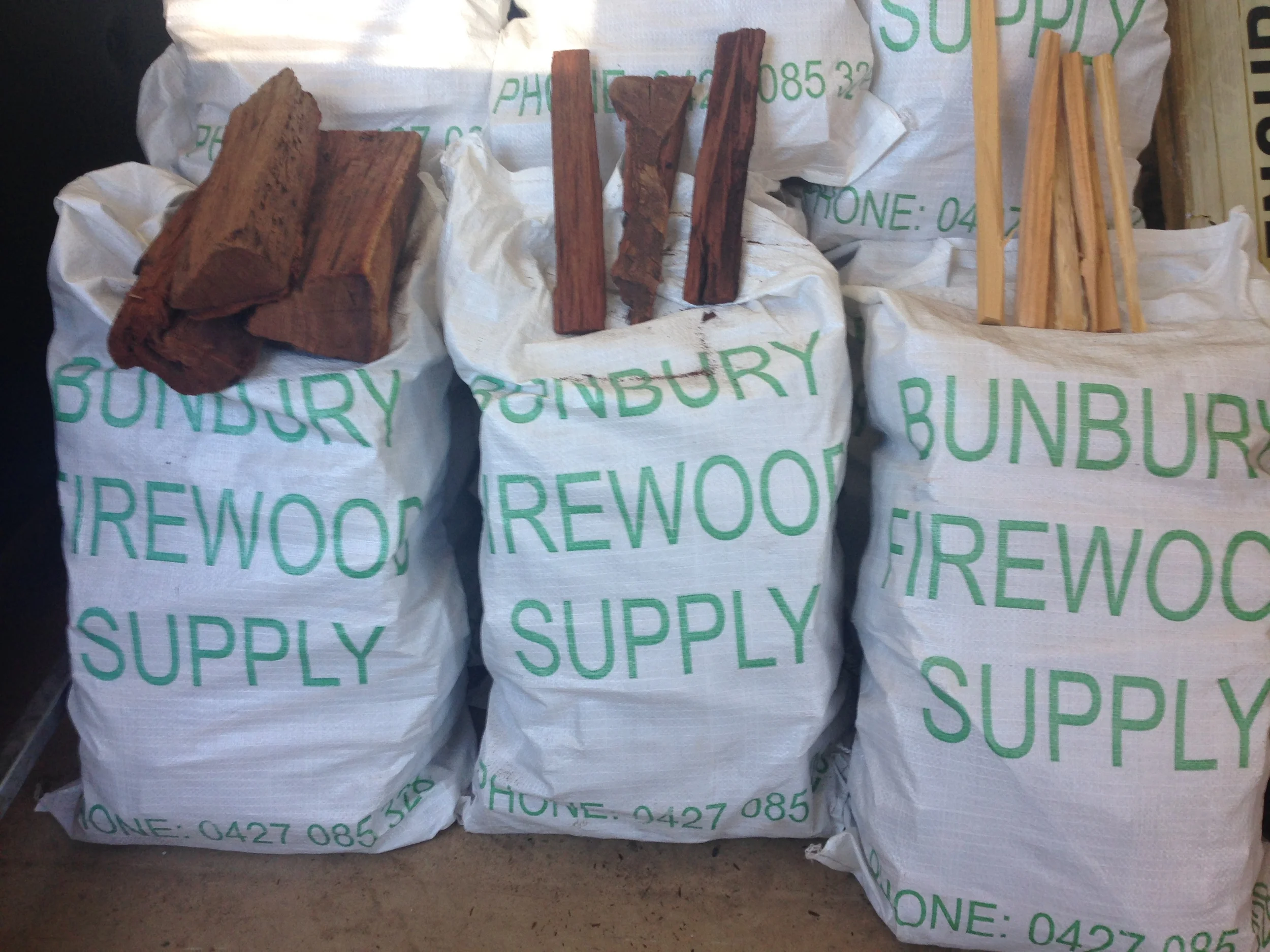 Bagged firewood and kindling.