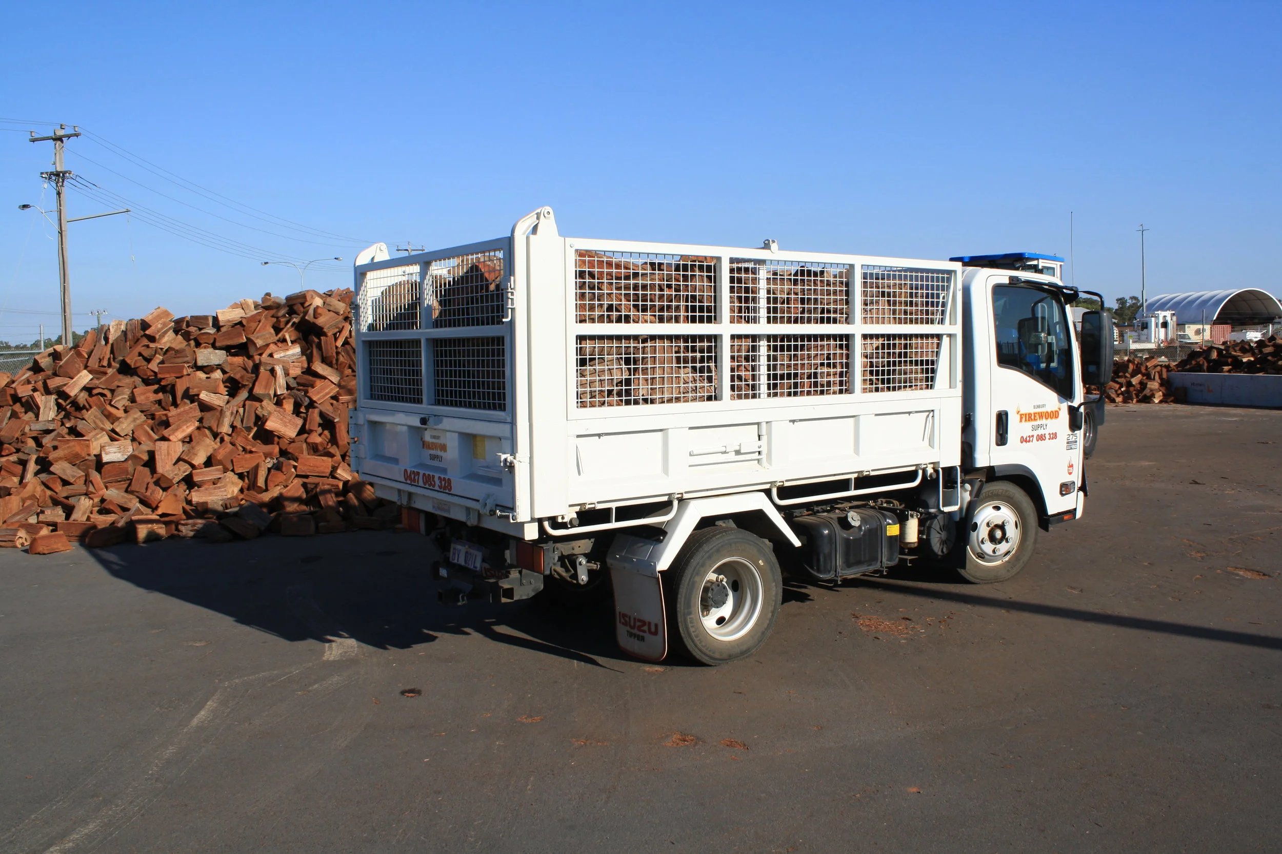 The modified tip truck for deliveries can hold up to 14 scoops