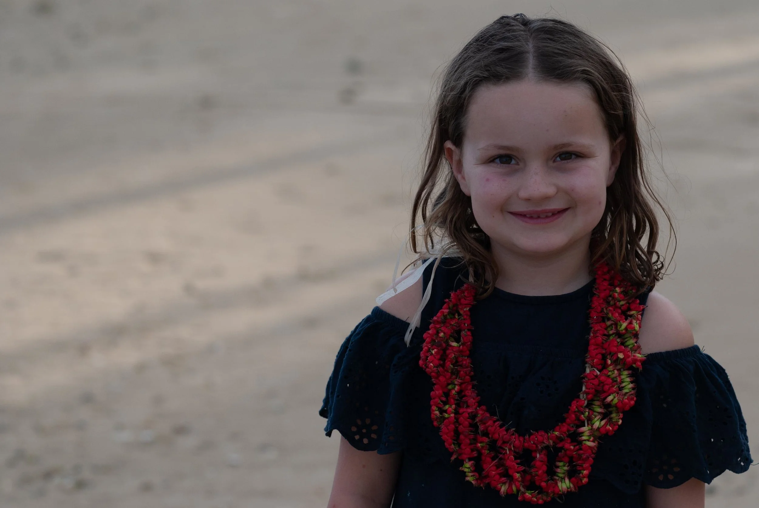 Izzy with her Tonga Lei given to her by Ana at the end of the show the evening before.