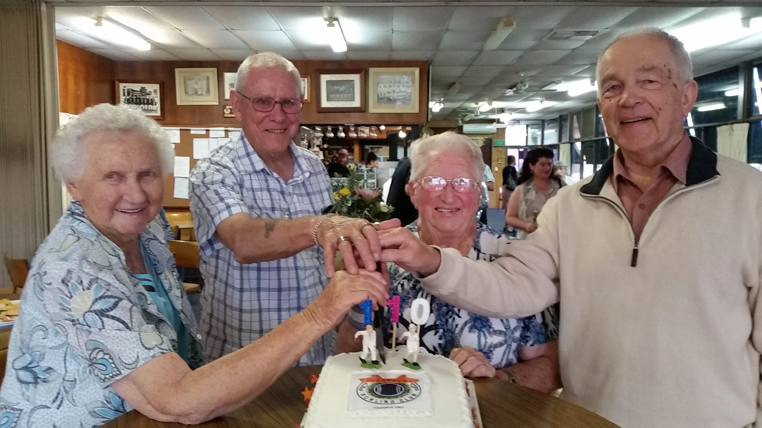Life members cutting our anniversary cake.jpg