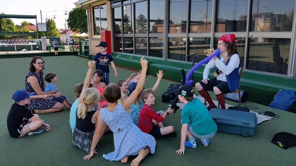 Captain Adam entertaining the kids.jpg