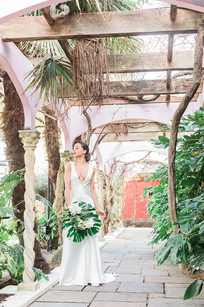 We used vintage, muted colours to reflect the 1950s time capsule that is Cuba, as well as tropical brights to enhance the fun, flirty vibe. On the tabletop we had a beautiful combination of the two - lush greens with faded peach florals and vibrant coral candles to create a dynamic, busy look.