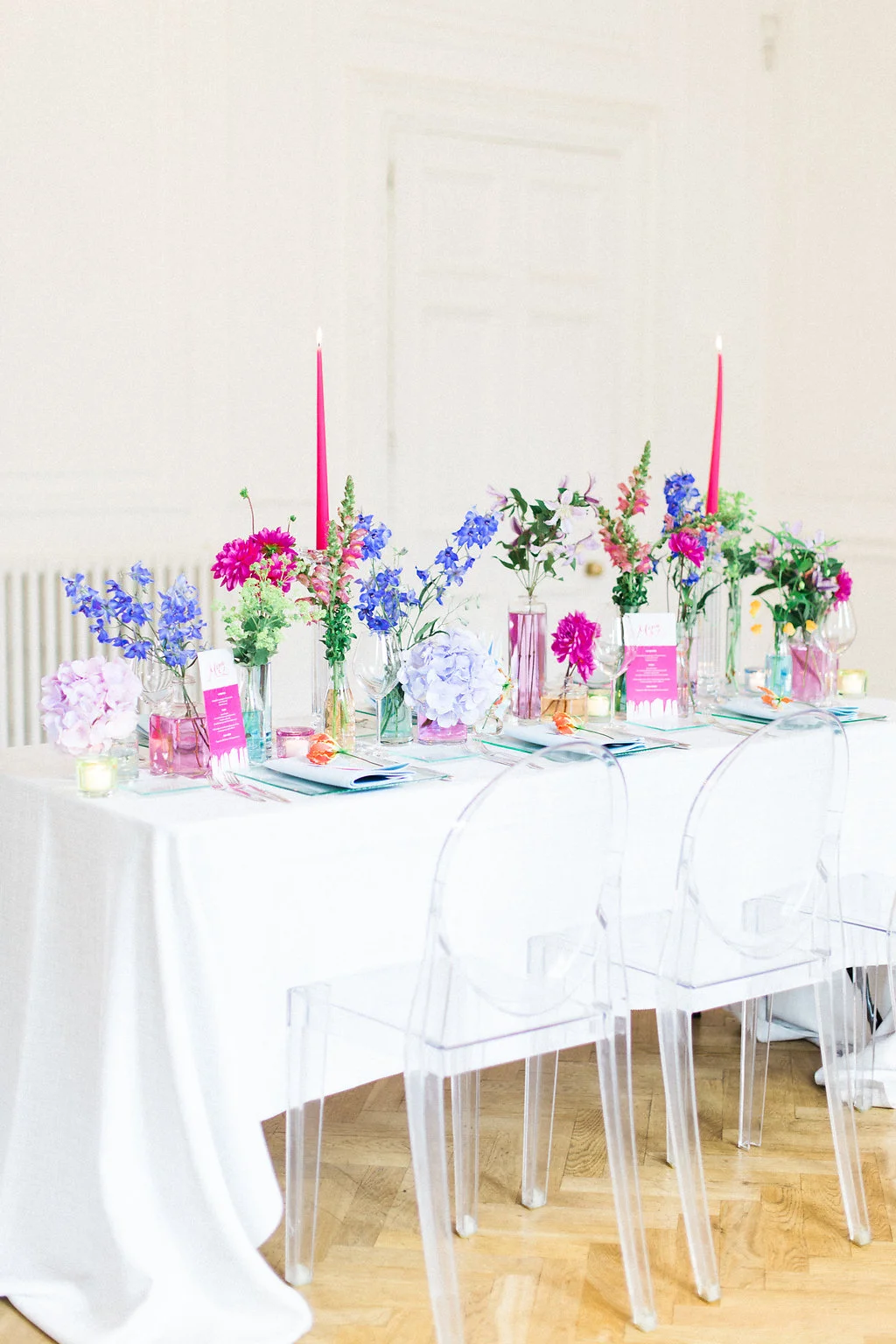 Mary Jane Vaughan smashed it when it came to the flowers - coming up with the genius idea of filling the vases with food dye in water, to enhance the colour palette of the table.