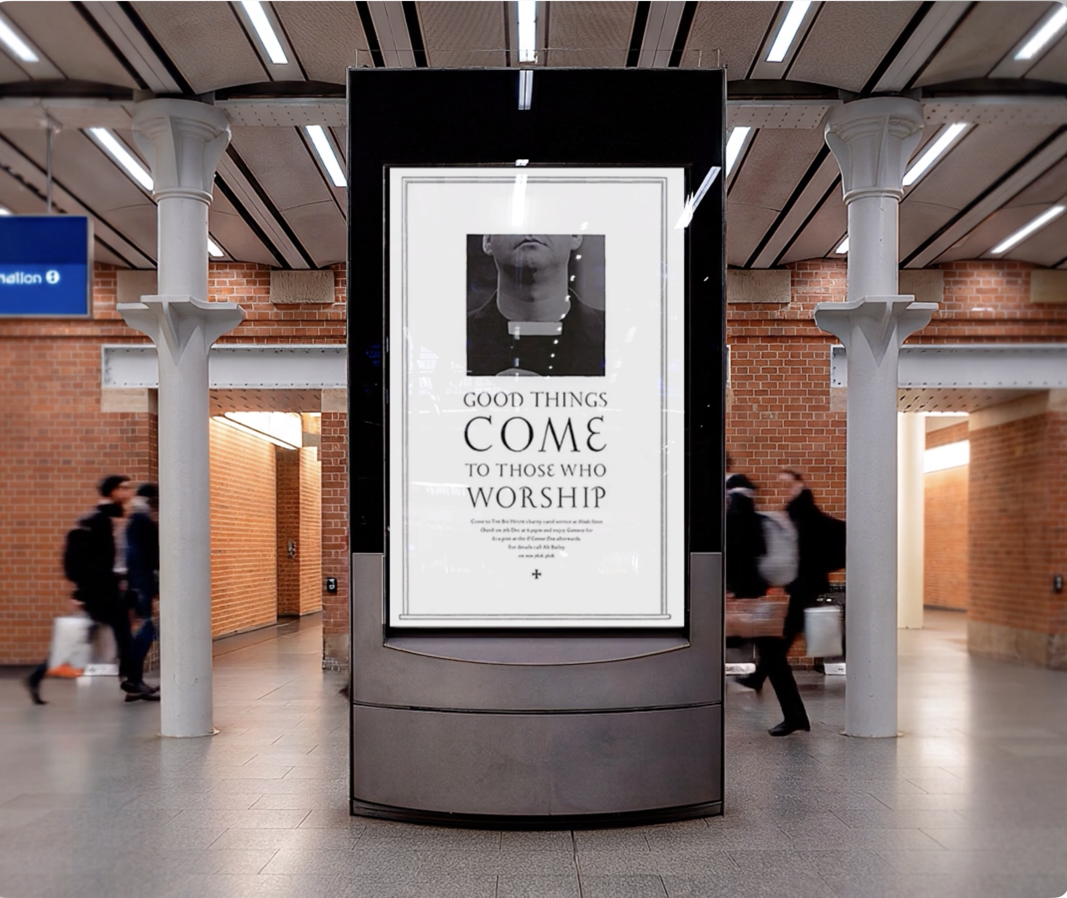 A large poster with the text 'Good things come to those who worship' in an indoor public transportation station with brick walls and several people walking by. AMV BBDO, credit for typography. Guinness.