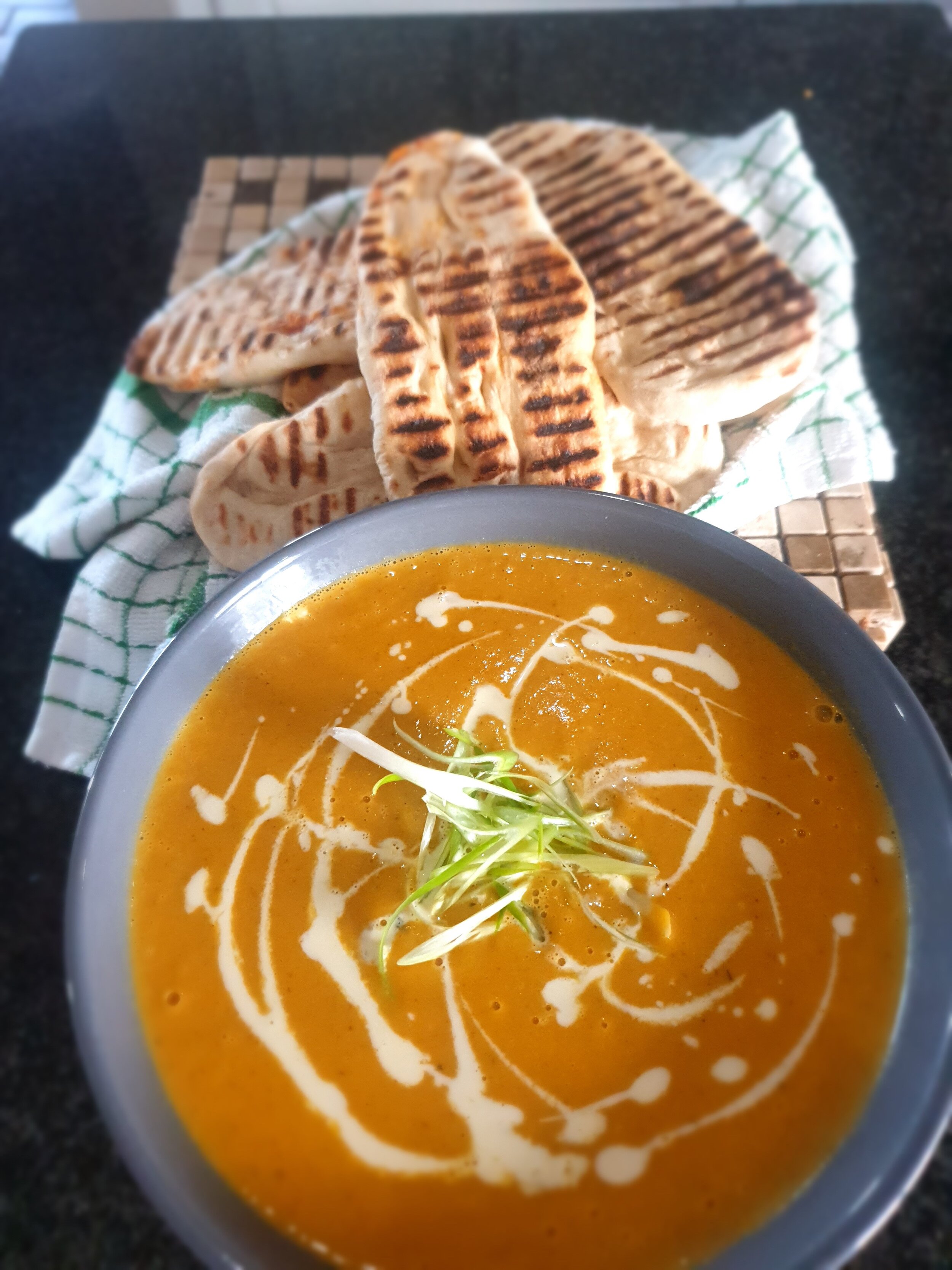 Curried butternut soup with sun-dried tomato &amp; herb flatbread