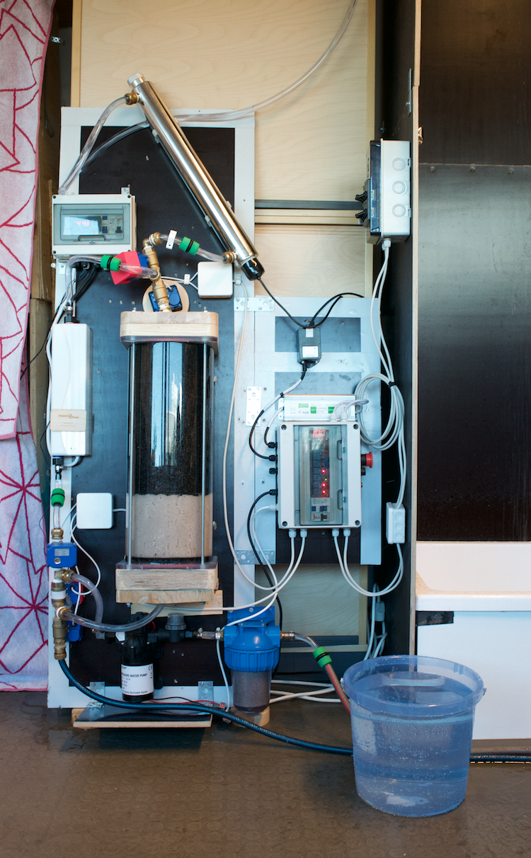 Current setup of the Showerloop system + a heating system. One bucket of water is all that is needed to fill the filtration system, and have some water left over for showering. 