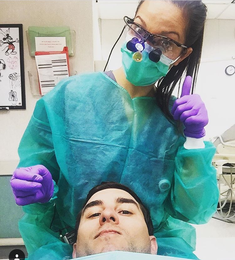 That's my husband, Aaron...He's obviously thrilled for his Invisalign appointment :)