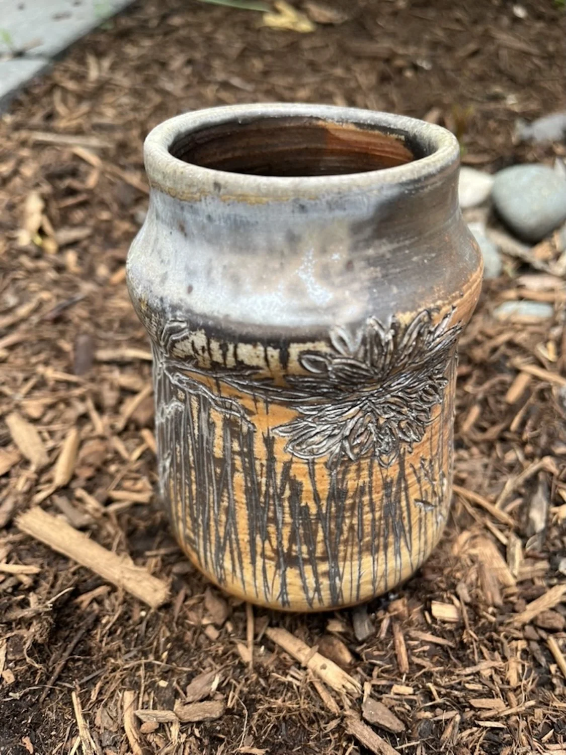 train kiln carved botanical short vase.jpeg