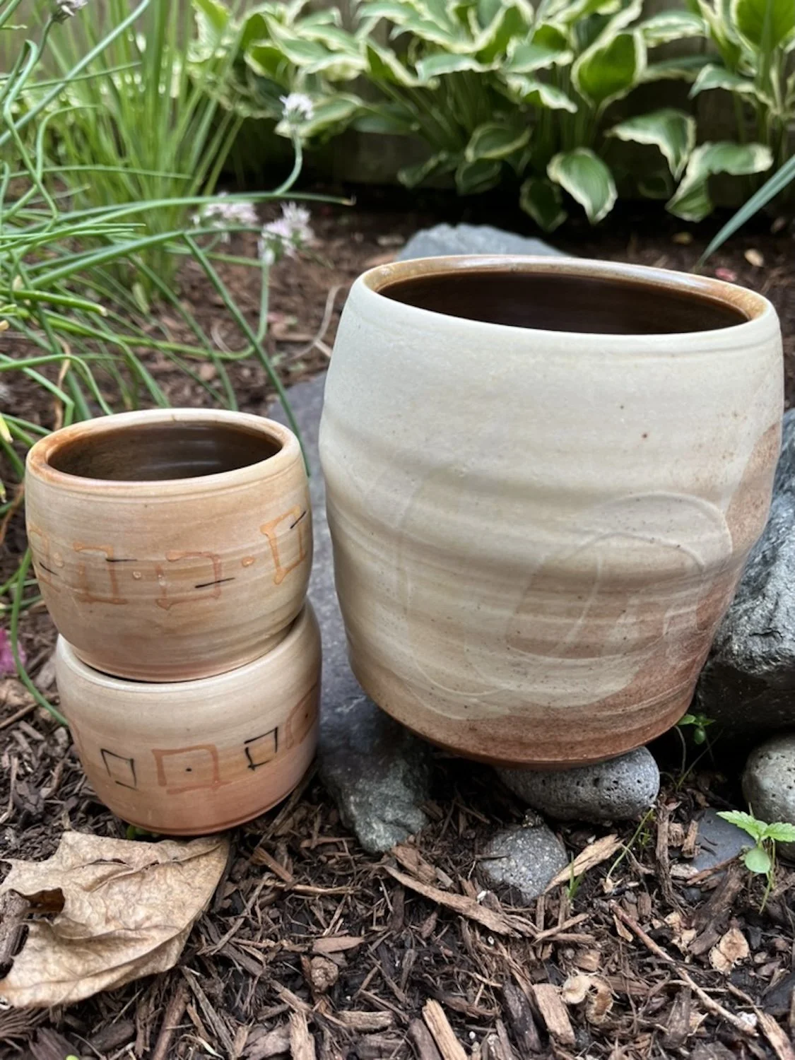 cat arch fired sippers and wine cooler.jpeg