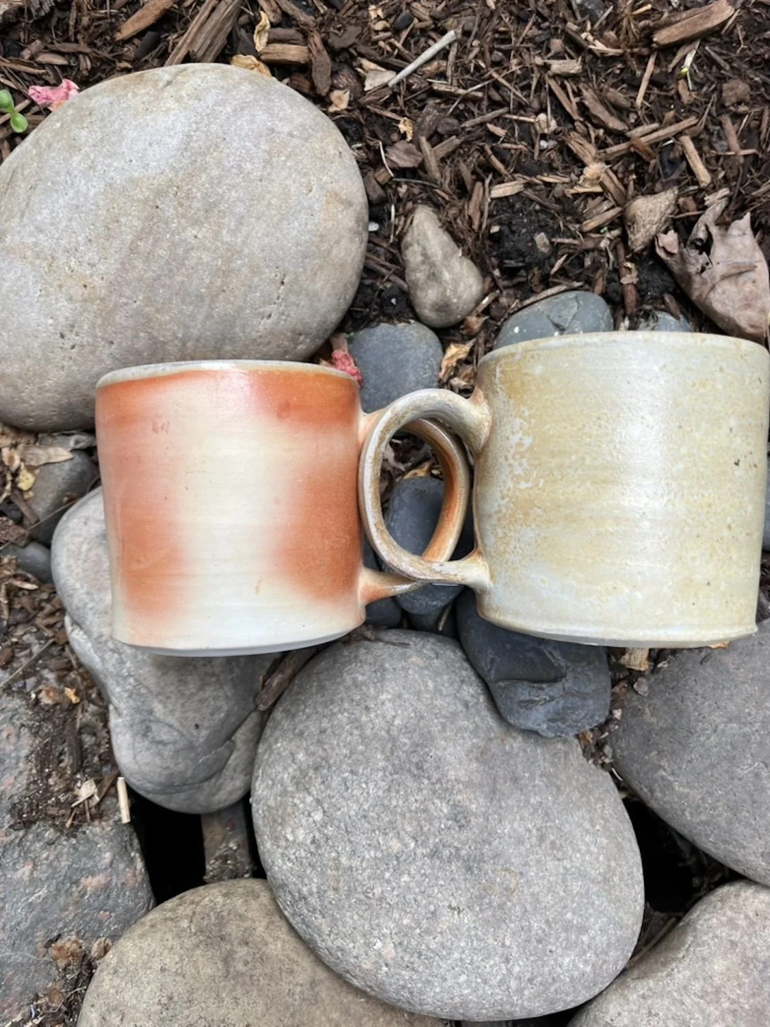 naked porcelain wood fired mug pair.jpeg