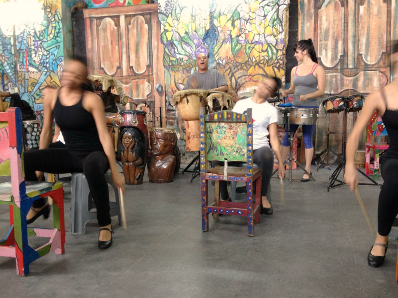 At Havana Compass Dance, these energetic, very talented young ladies (who never stopped smiling!) learn a traditional style of Cuban drumming on hide-covered chairs. These chairs have long been used by farmers all over the island and have become a symbol of Cuban pride. Privately owned, this dance company provides free instruction to all. The center is supported by performances, selling original art made by their founder, and accepting donations.