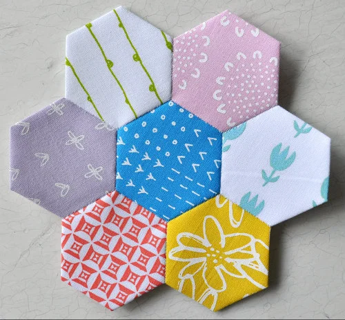 Cheerful Grandmother's Flower dressed in Karen Lewis Textiles fabrics - totally appropriate for celebrating "Girl Power'!