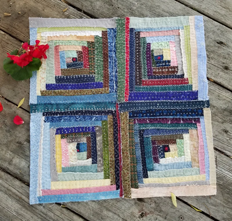 Raw edge log cabin tapestry, hand pieced and hand stitched. Barbara Eaves, 2019.