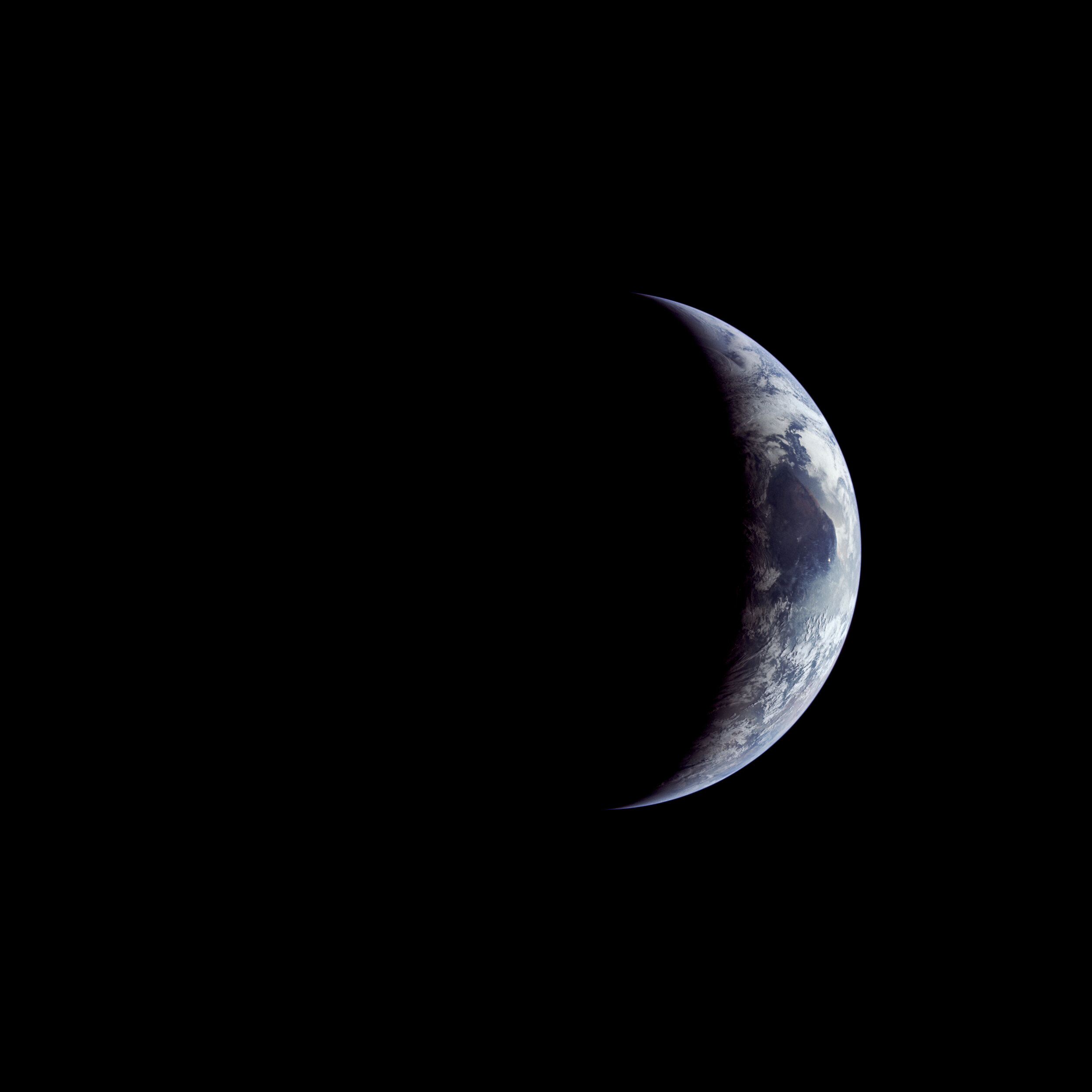  Apollo 11  A beautiful crescent Earth. Taken by the Apollo 11 crew on their way home. In this image, North is down. Near the centre is the southern tip of Africa, pointing upwards. Sunlight glints off wetlands and rivers.   ‘Oddly enough the overrid