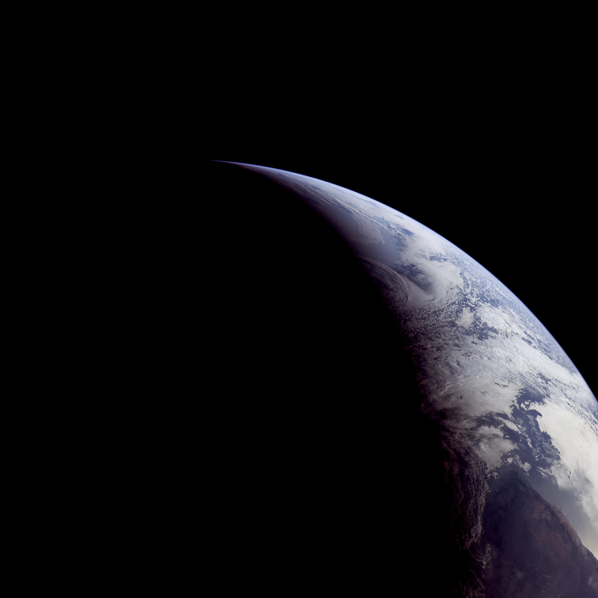  Apollo 11  Taken by the Apollo 11 crew on their way home. In this image, North is down. Near the bottom is the southern tip of Africa, pointing upwards. At the top, we see the crescent Earth taper away to nothing.   ‘The thing that really surprised 