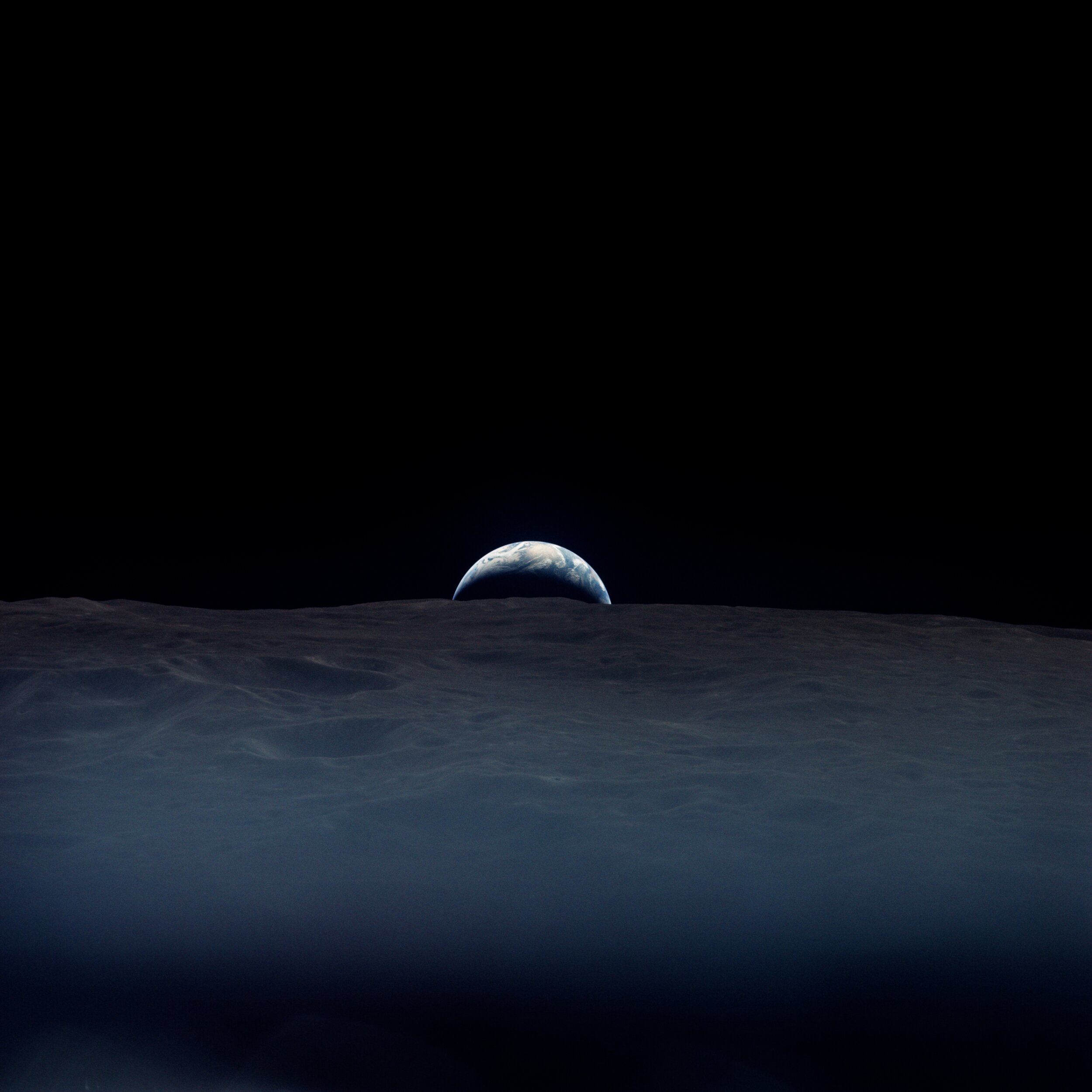  Apollo 12  A haunting crescent earthrise.  It was taken by Richard Gordon, alone aboard the Command Module while the others were down on the lunar surface. Under the clouds lies the Indian Ocean.   Full Resolution   Date – ~12:00 UTC 19 Nov 1969 Len