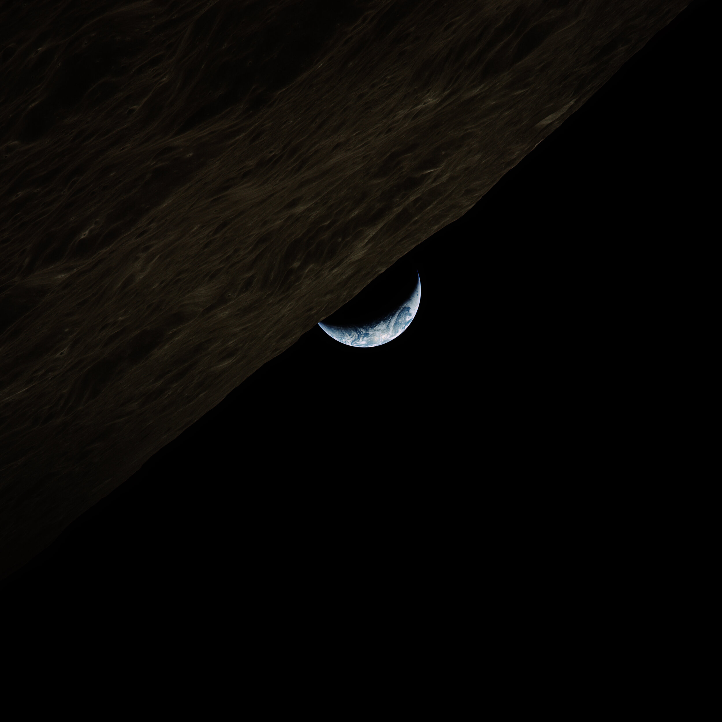  Apollo 17  A surreal crescent earthrise. Taken by the crew of Apollo 17, a day after they had reunited in lunar orbit. They would have no idea that it would be more than fifty years before someone else will again touch the Moon.   Full Resolution   