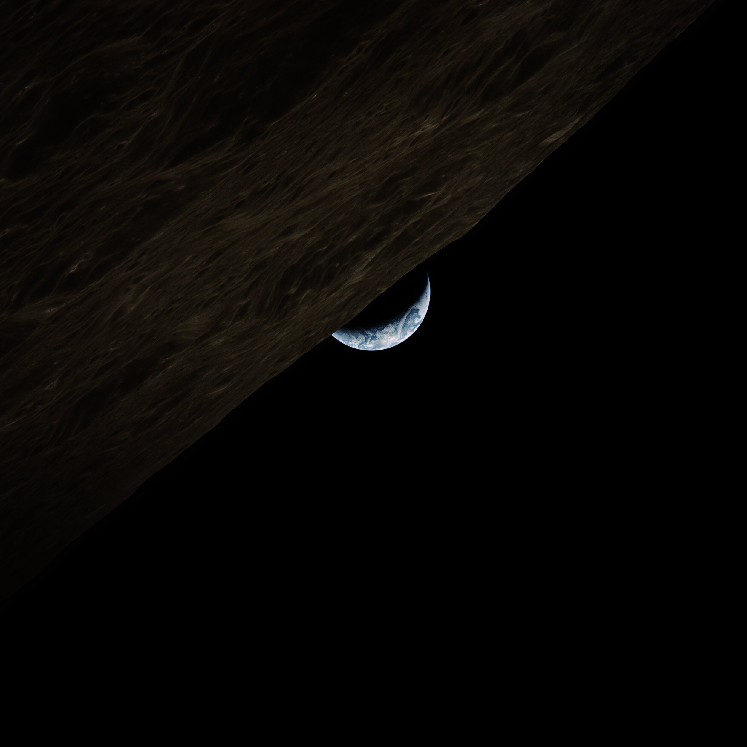  Apollo 17  A surreal crescent earthrise. Taken by the crew of Apollo 17, a day after they had reunited in lunar orbit. They would have no idea that it would be more than fifty years before someone else will again touch the Moon.   Full Resolution   