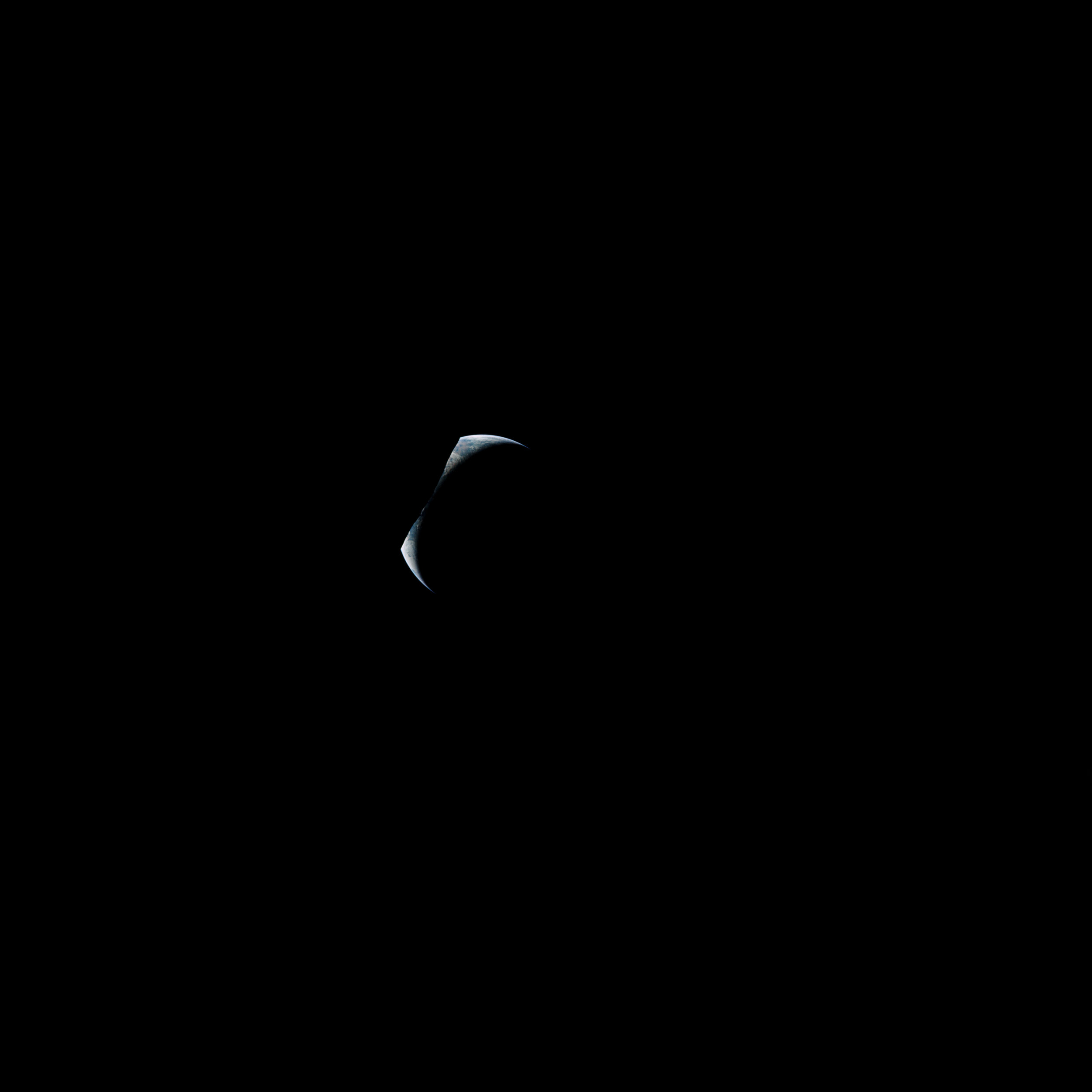  Apollo 17  A rare sequence capturing an earthset. The Earth disappears behind an unlit lunar horizon—consumed in the darkness.   Full Resolution   Date – ~15:25 UTC, 16 December 1972 Lens – Zeiss Sonnar ƒ-5.6/250mm Code – AS17-152-23279 Scan – LPI (