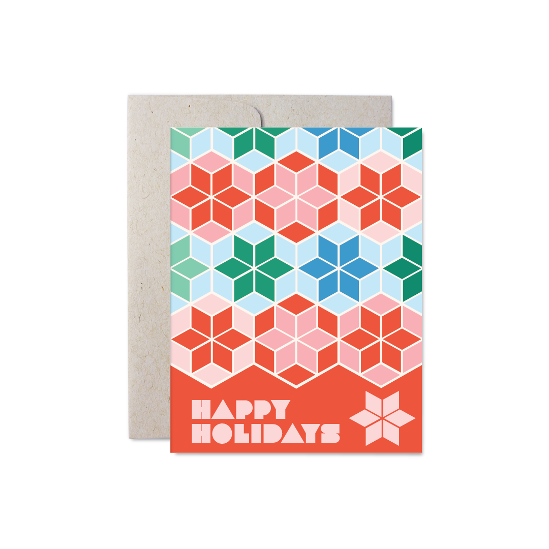Pattern greeting card with geometric snowflakes in green, blue and red. Card reads "Happy Holidays"
