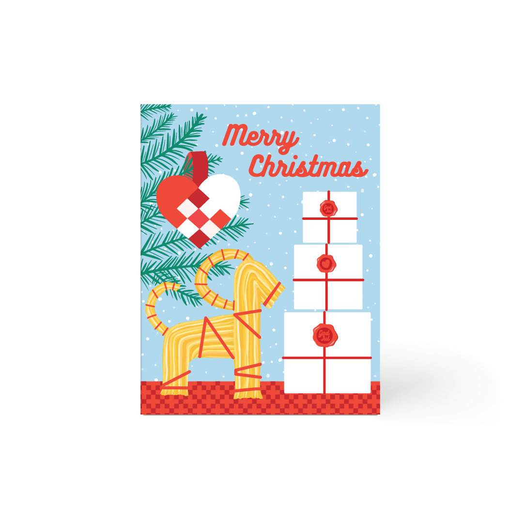Christmas three with Swedish woven heart ornament, gifts and yule goat.