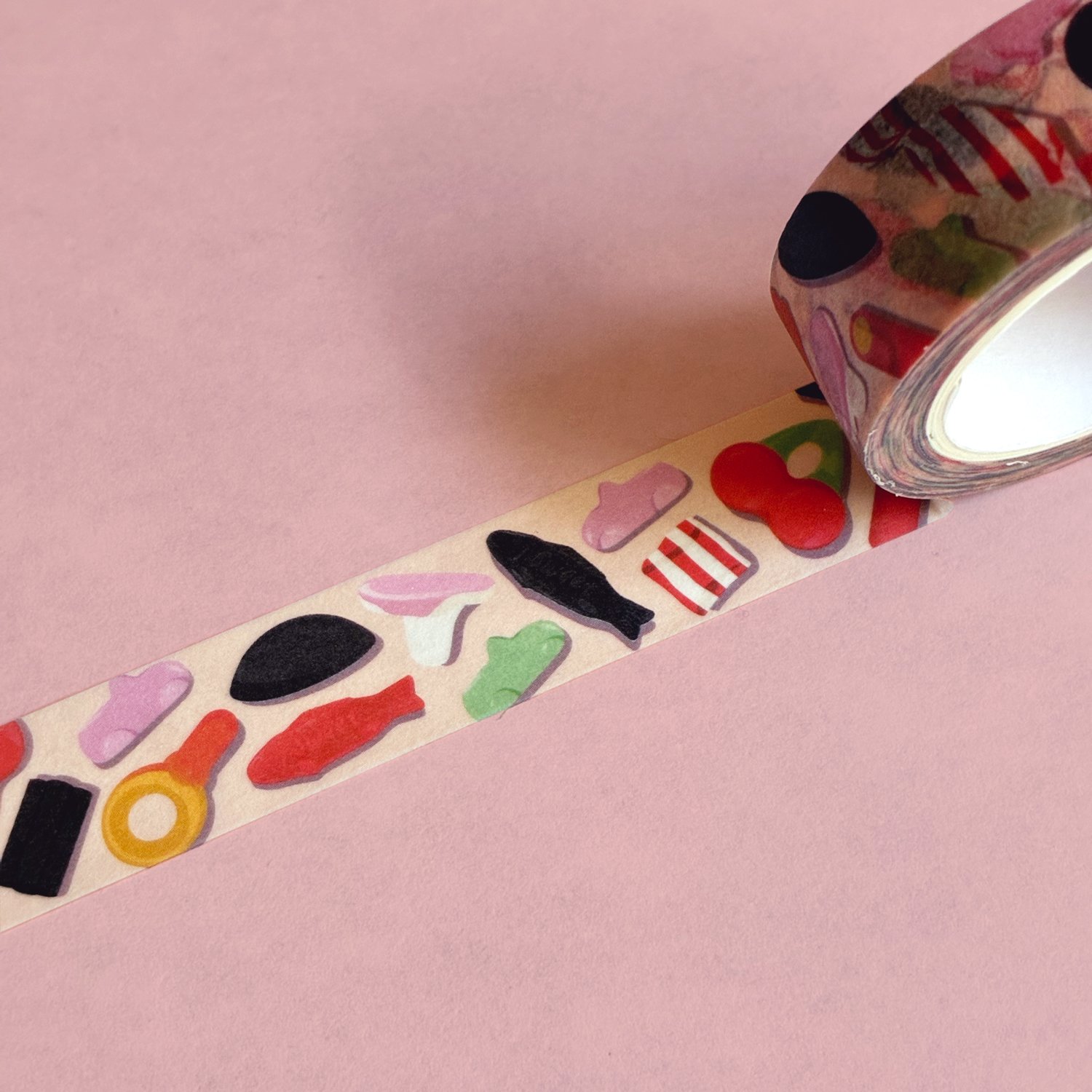 whimsical design with Swedish pick-and-mix treats (lördagsgodis), featuring customer-favorite illustrations of licorice fish, gummy rings, and wrapped sweets.