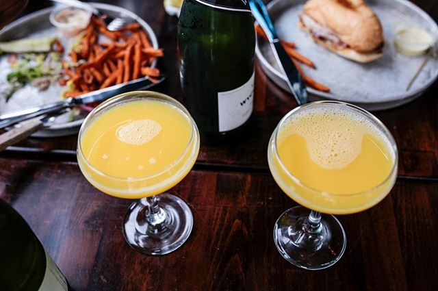 Filling our weekend with mimosas...and air conditioning 😇Brunch goes till 3pm, dinner menu till late 🍽