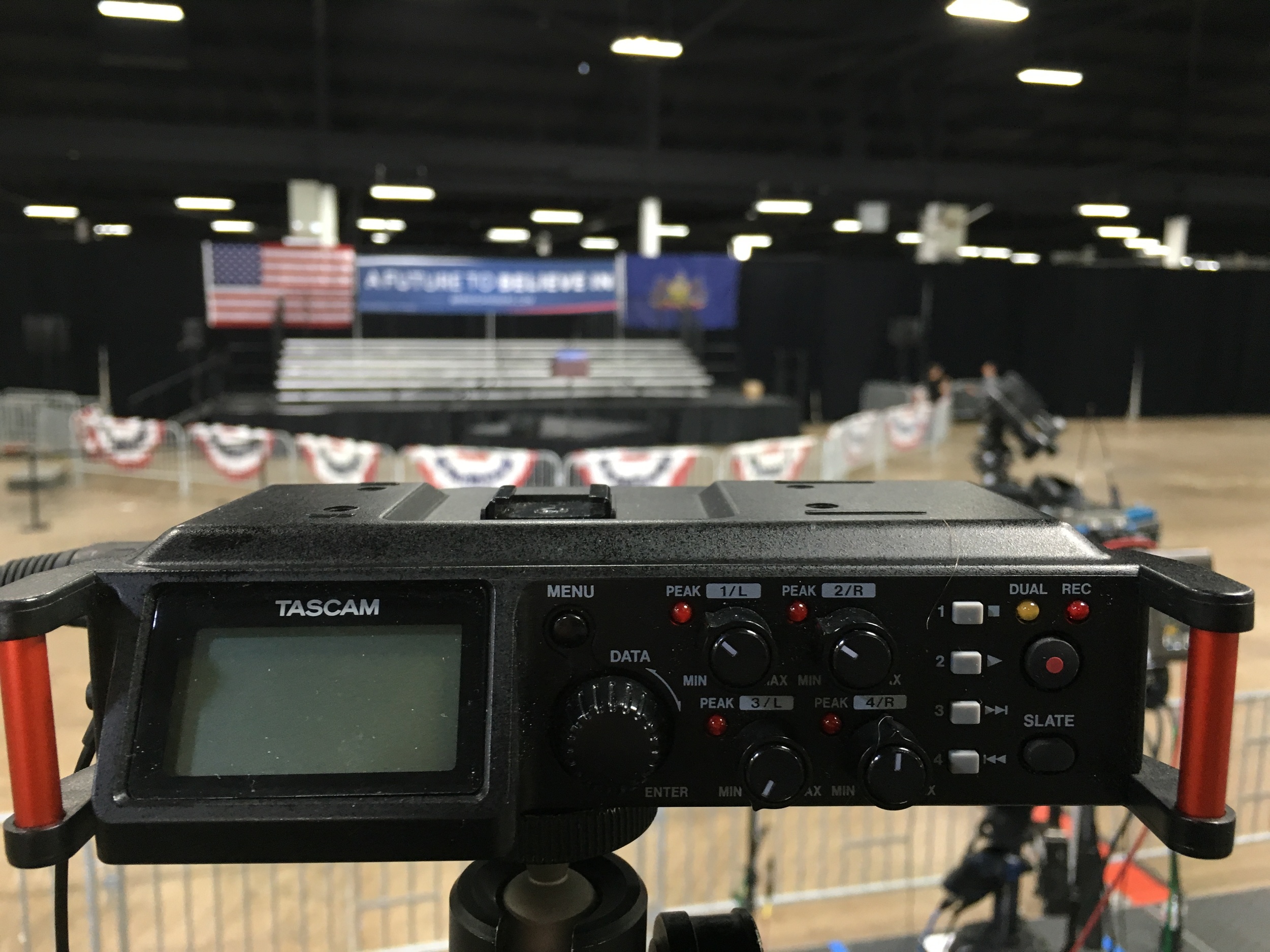 TASCAM DR70-D hooked into the sound board, with a pair of built-in mics running on channels two and three for ambient. Tip from Captain Obvious: a guy saying "check, check, 123" hours before a presidential candidate gets up to the mic and connects with his crowd isn't going to have the same level, so make adjustments.