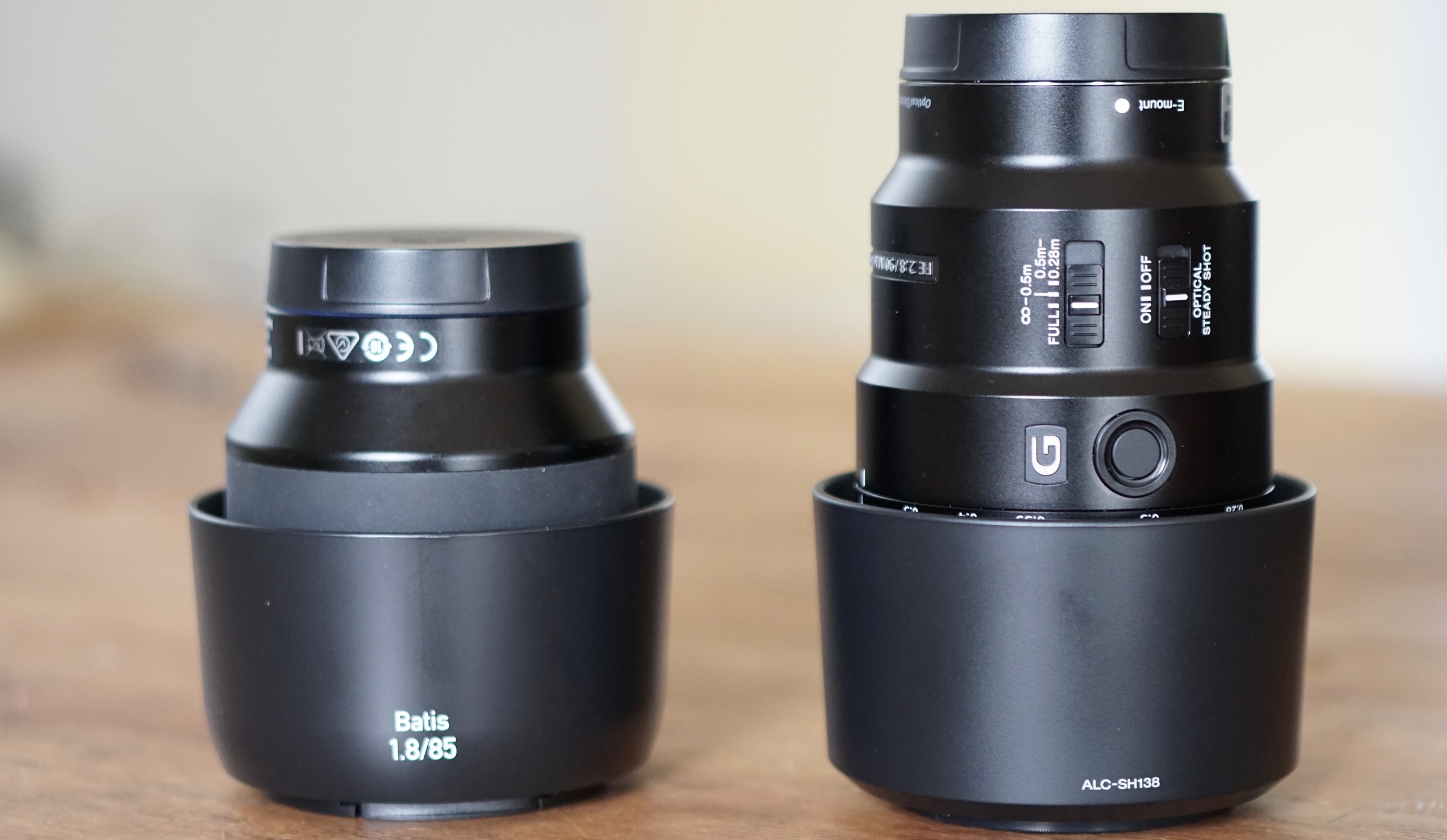 Zeiss Batis 85mm f/1.8 on left, Sony FE 90mm f/2.8 Macro G OSS on right. Both are stellar.