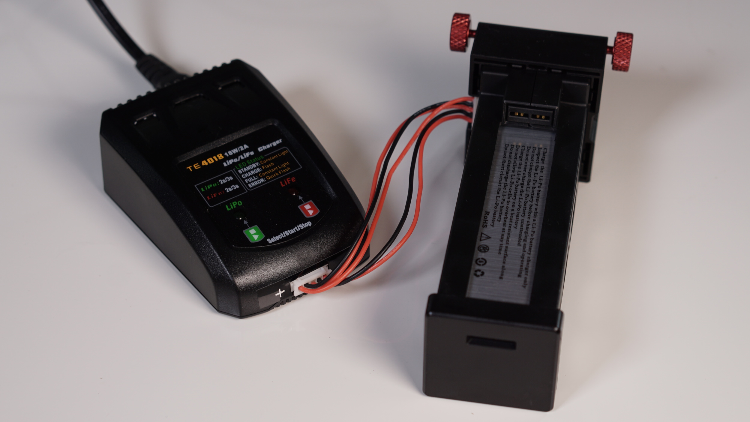 There's a very robust connection between the battery and the gimbal itself, but when charging the battery you have to contend with this set of wires. INVASION OF THE BODY SNATCHERS - CAME-TV's technology is still in transition!