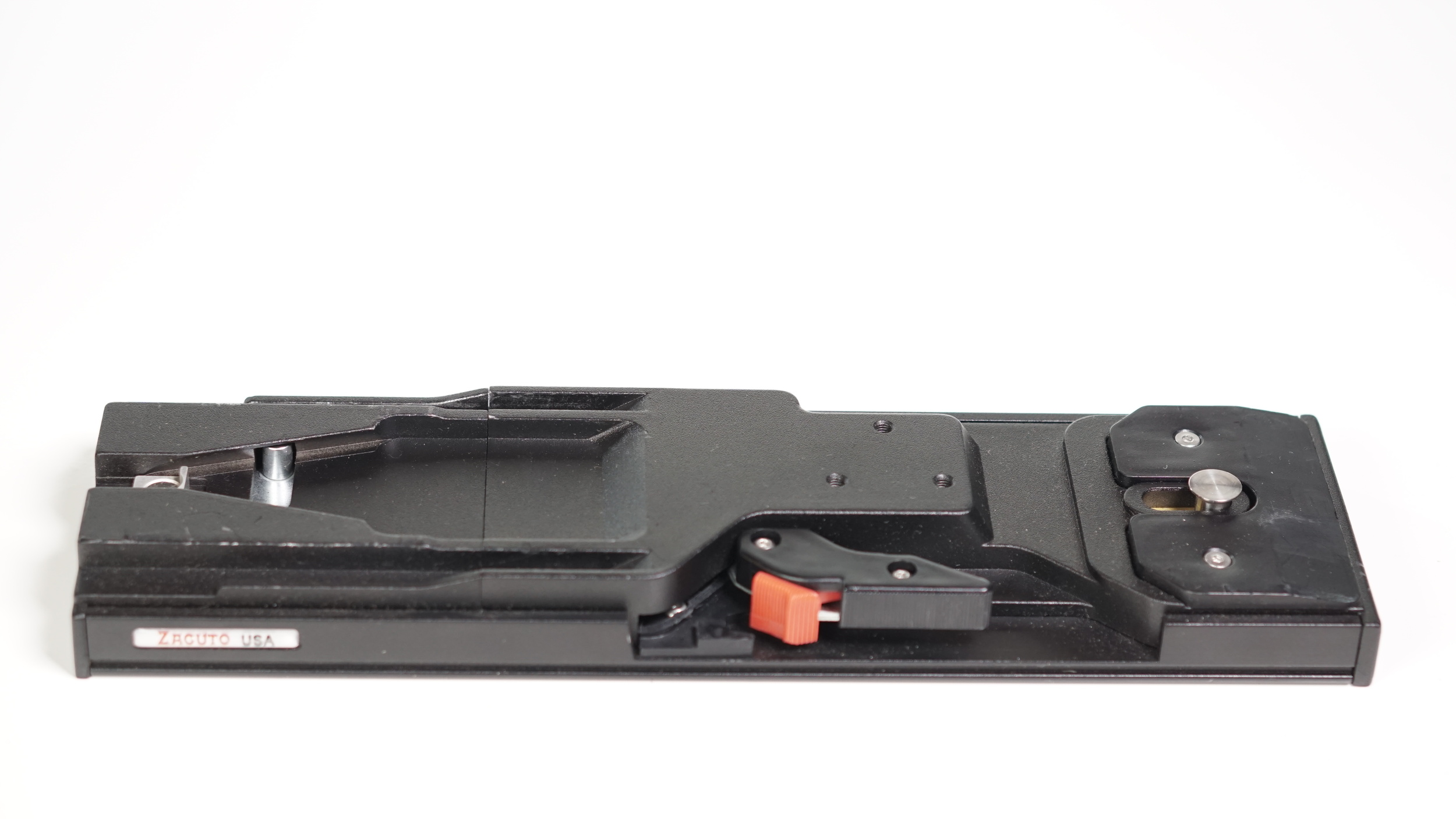 This is the Zacuto VCT Tripod Plate . It makes standard quick release clamps look inadequate. Go back up to the first or second photo in the article to see just how big this sucker is.