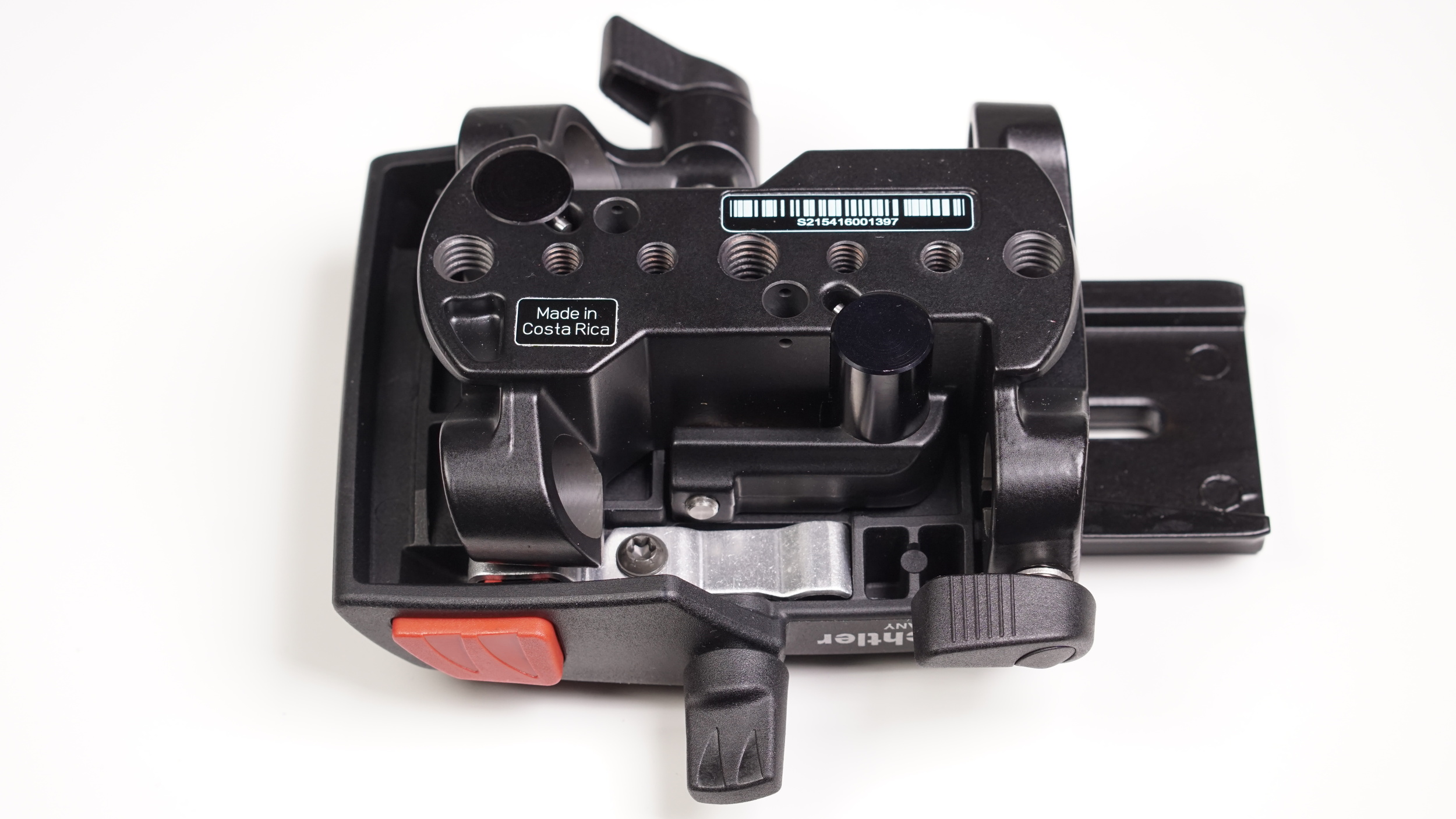 The underside of the Sachtler Ace base plate is the best angle to appreciate the forethought and complexity that goes into its design: many mounting points, robust, solid metal riser rods, differently sized and shaped levers fit to purpose, elegantly shaped core block - wow.