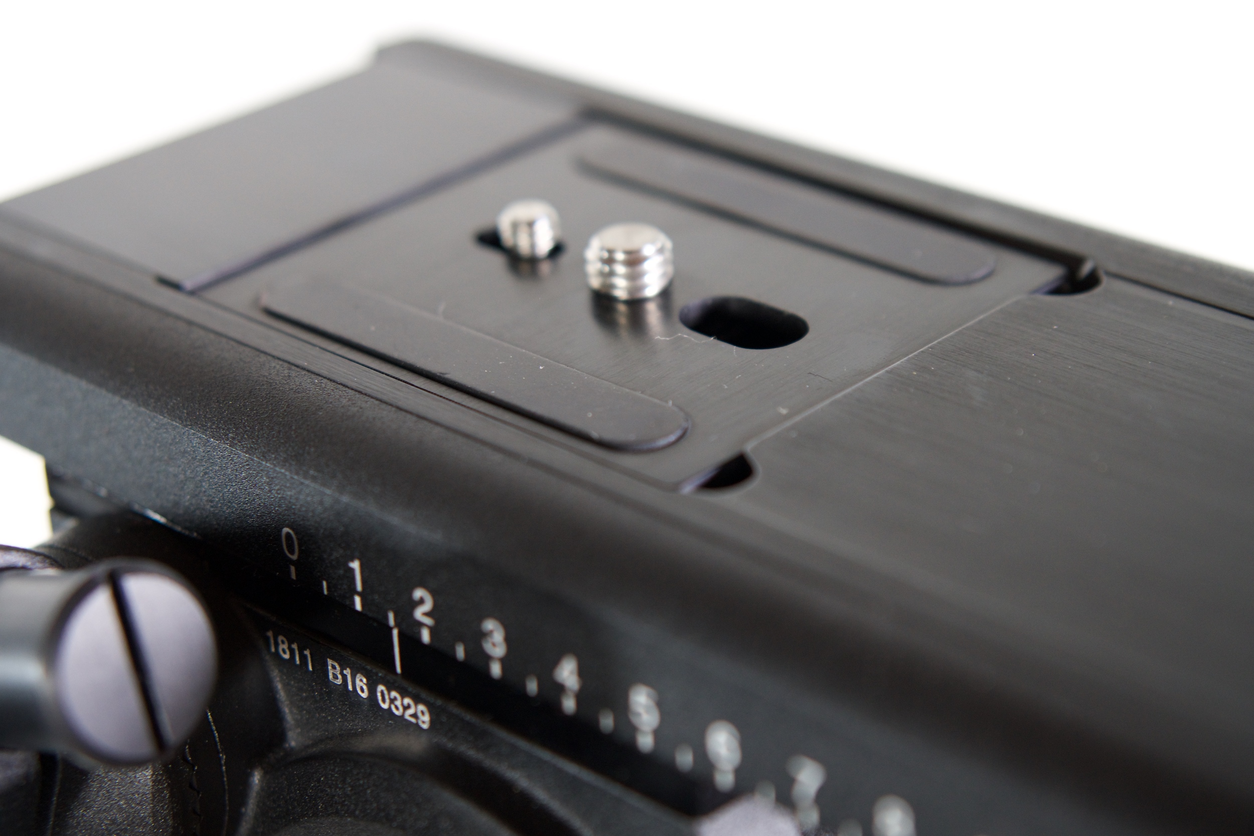 If you have to remove the camera, you lift it out of the sliding and lockable base, thus preserving the exact set up you've slaved to get right. Can't do it with the same precision or repeatability on the Cartoni.
