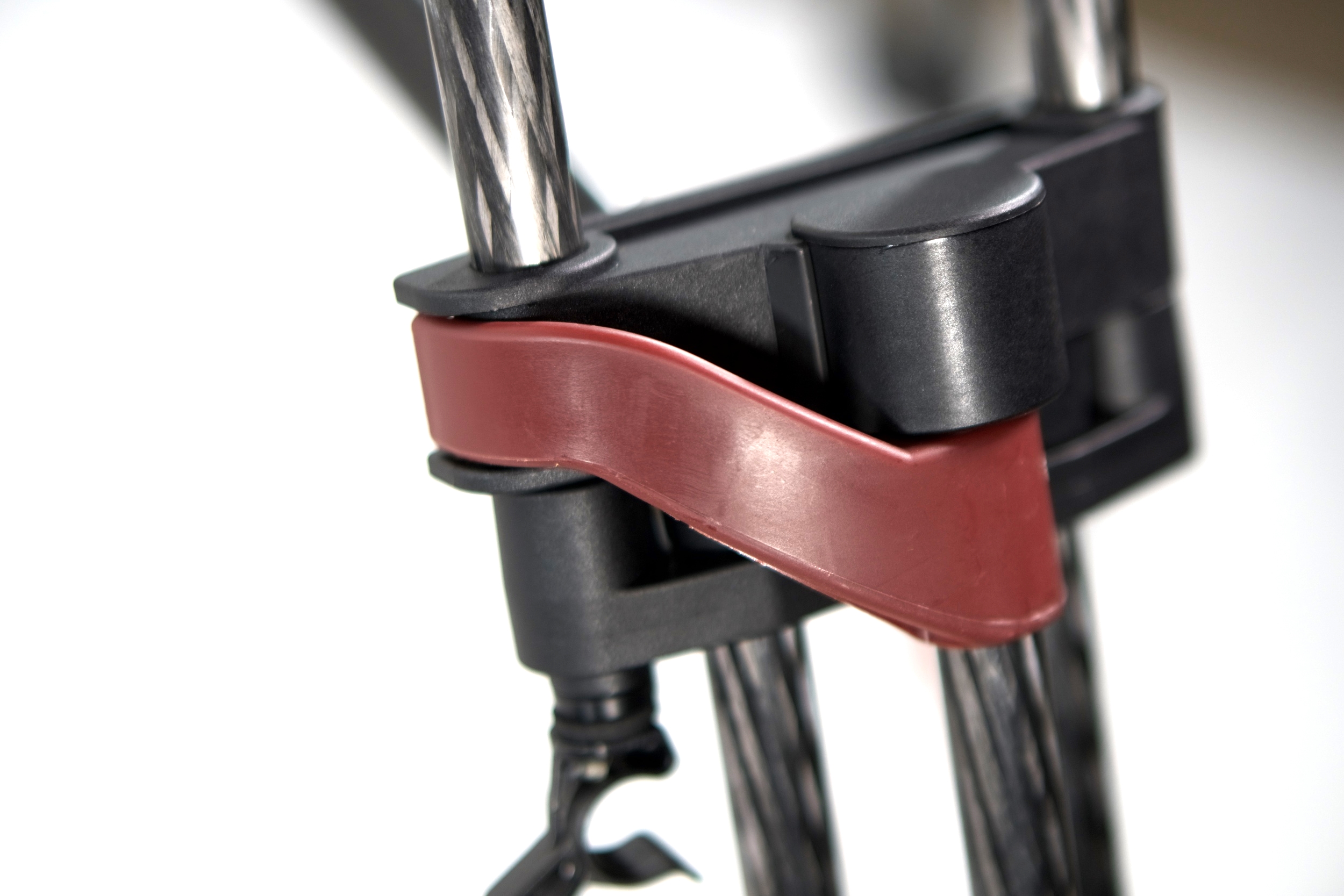 The Sachtler locking mechanism is a bit different too, but it still a left/right orientation. I think it's a little easier to pinch your fingers this way, though it hasn't happened yet.