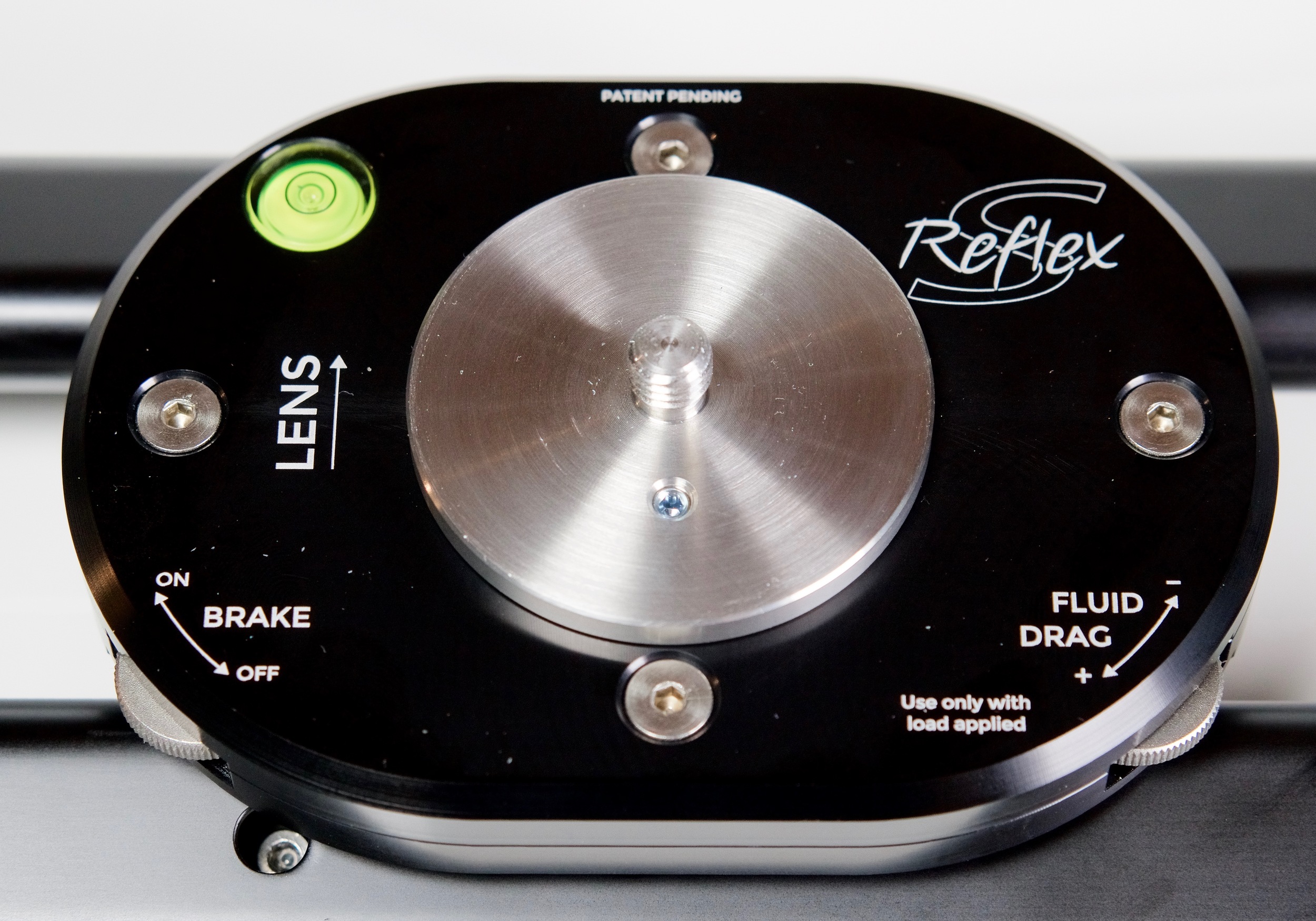 First time I've seen fluid drag on a slider. I double-checked to confirm it really is fluid drag. Confirmed directly from SmartSystem: "The reflex s has the fluid friction instead of the old version (reflex without s) that has an old friction system." Just make sure the brake is turned completely off, a nd don't adjust the drag until you've got your camera and head attached to the tray.