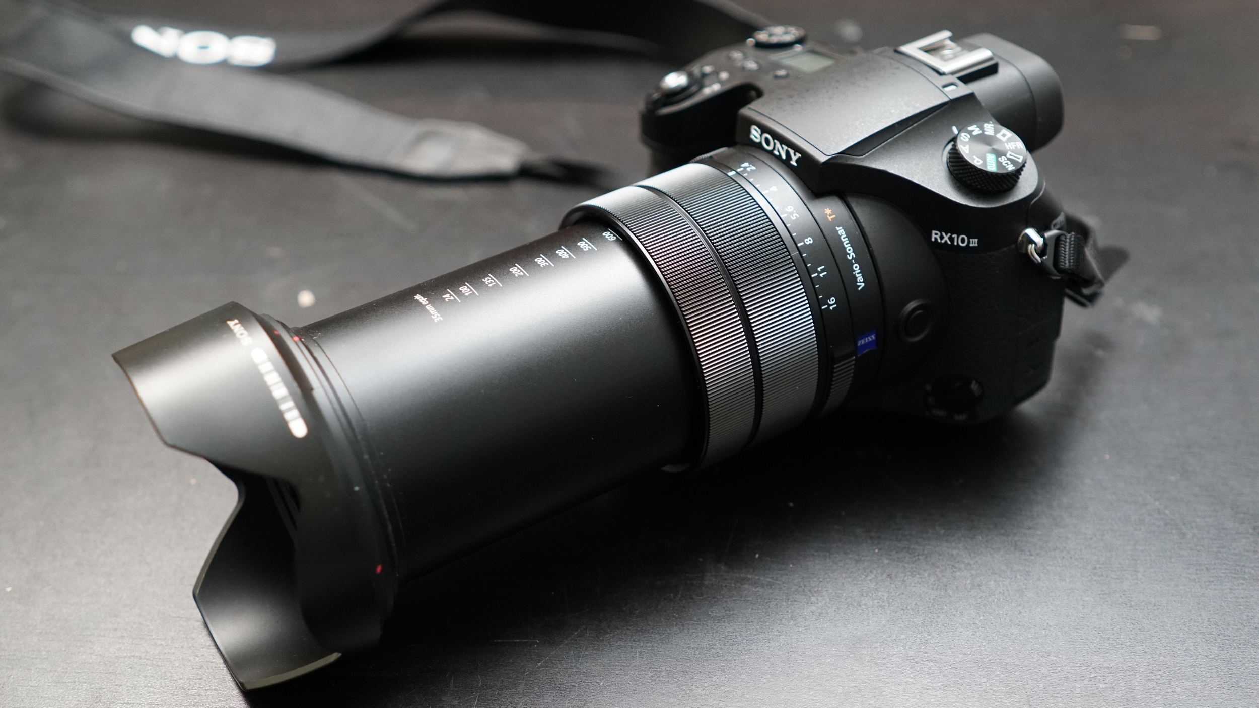 At $1,498, Sony's RX10 Mark III is just about one-fifth the price and half the weight of the 300mm f/2.8 alone. Sure, it gives up a stop of light and uses a 1" sensor (still 20 megaixels). But for most of us, it's a much more reasonable set of trade-offs.