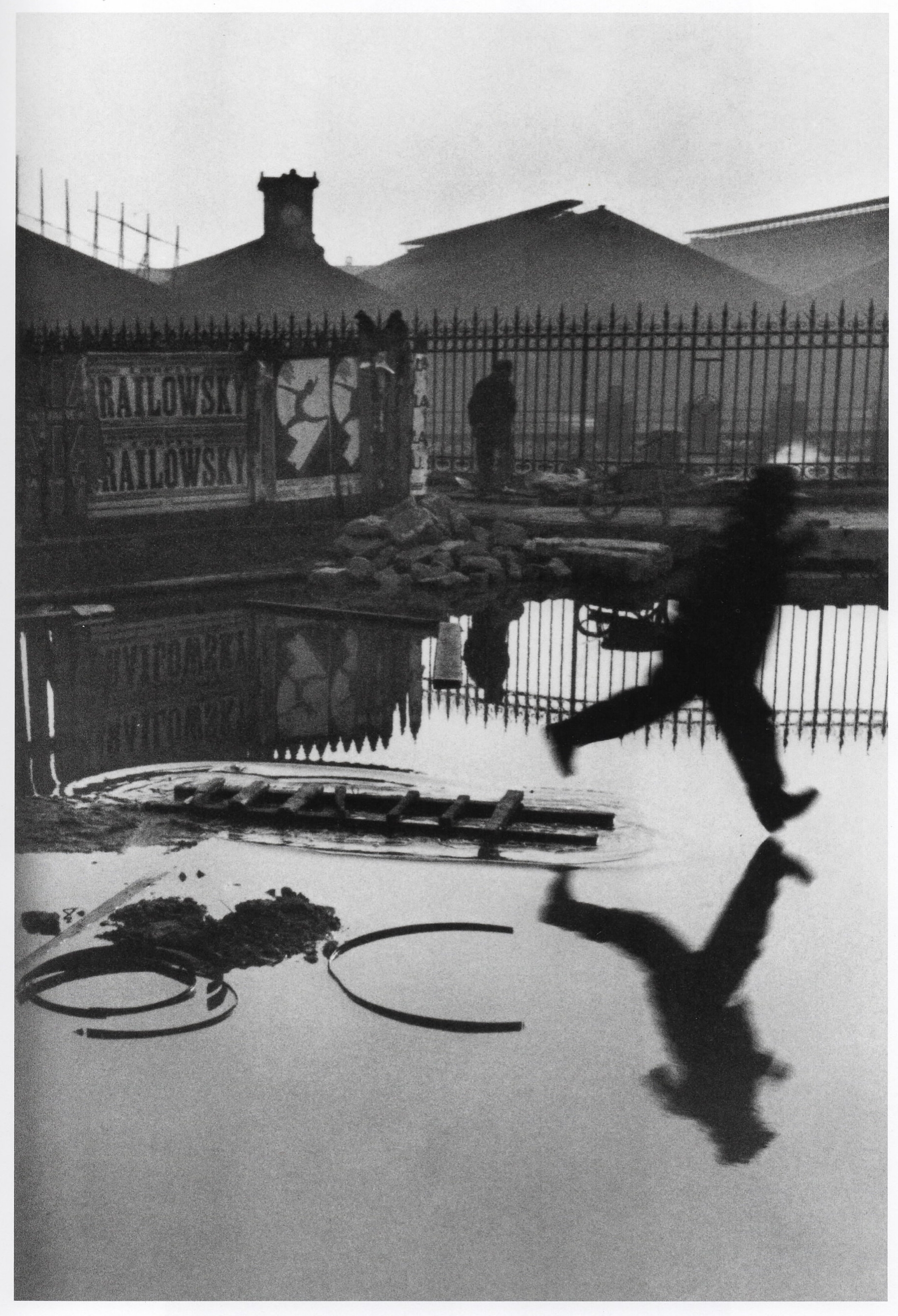 Fair use: THIS is a decisive moment, one of the most famous by the photographer who coined the phrase, Henri Cartier-Bresson. Copyright 2010 Henri Cartier-Bresson/Magnum Photos. Scanned from "Henri Cartier-Bresson The Modern Century," Copyright 2010 The Museum of Modern Art. The RX100 Mark V is a radically superior image capture machine compared to the Leica with which Cartier-Bresson took this photograph, but in the end this grainy, slightly blurred image taken almost 85 years ago proves that it's not the machine, it's the person. And that technical perfection is NOT always the goal.