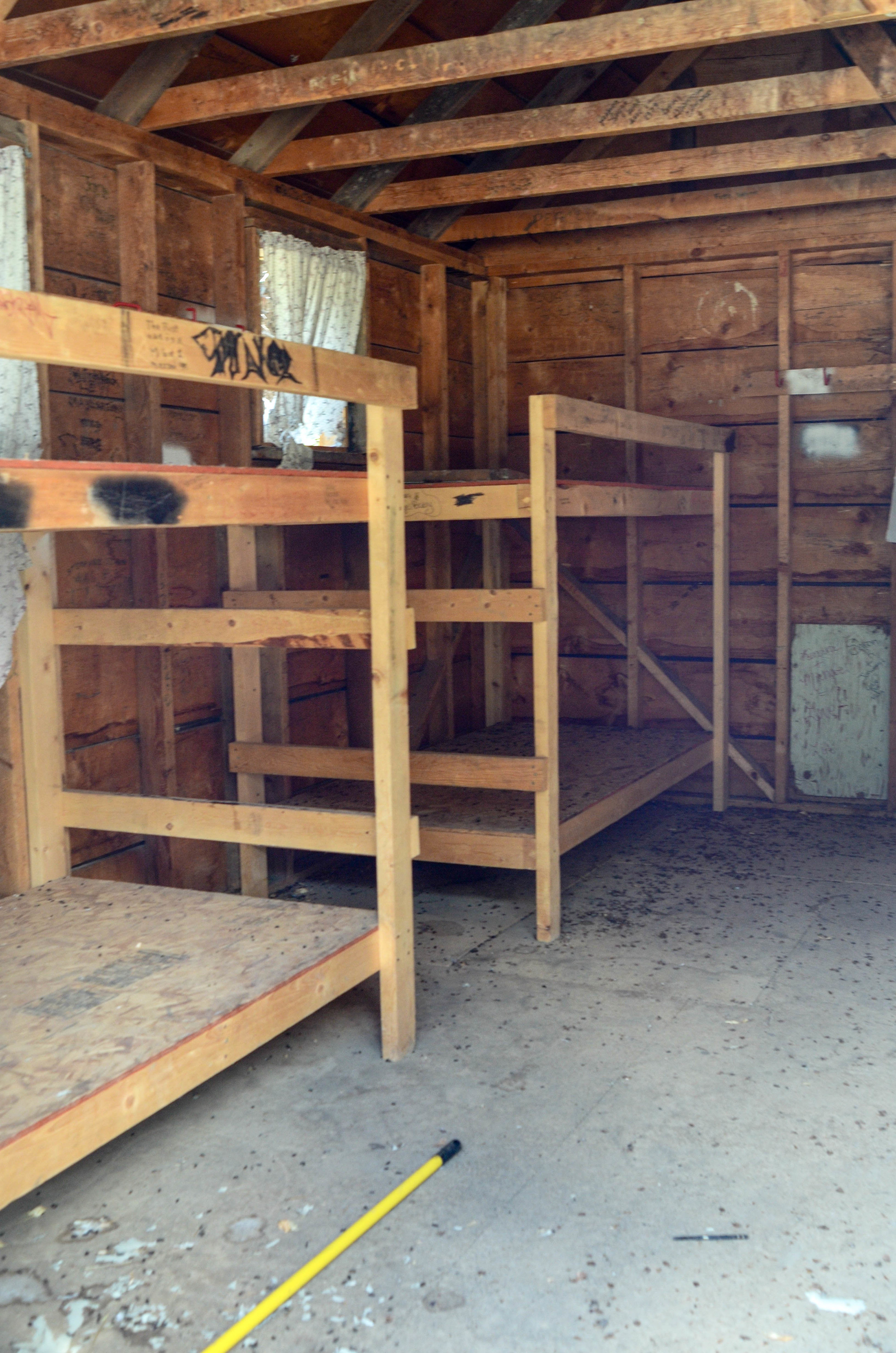Old bunk beds inside cabins