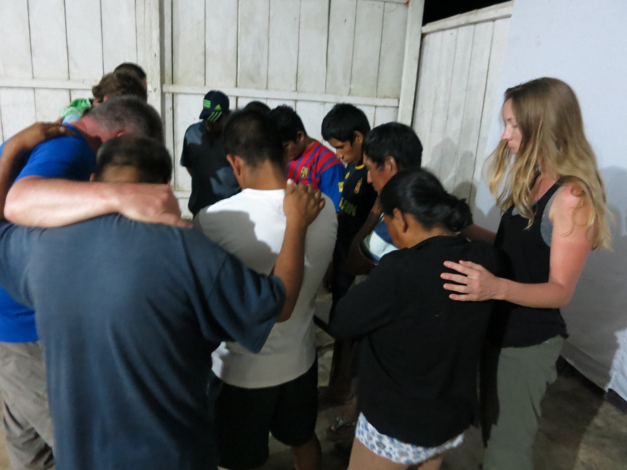 Neil & The Team praying over the men and women who made professions of faith