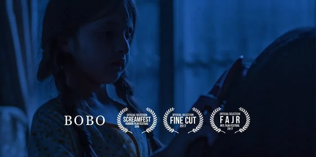  A single mother learns the disturbing truth about Bobo, her daughter's imaginary friend.  Written, Edited and Directed by Maazin Kamal and Munis Rashid Starring Malika Zafar and Mariyam Khalif Cinematography by Asad Faruqi  Original Music by Alex Ko