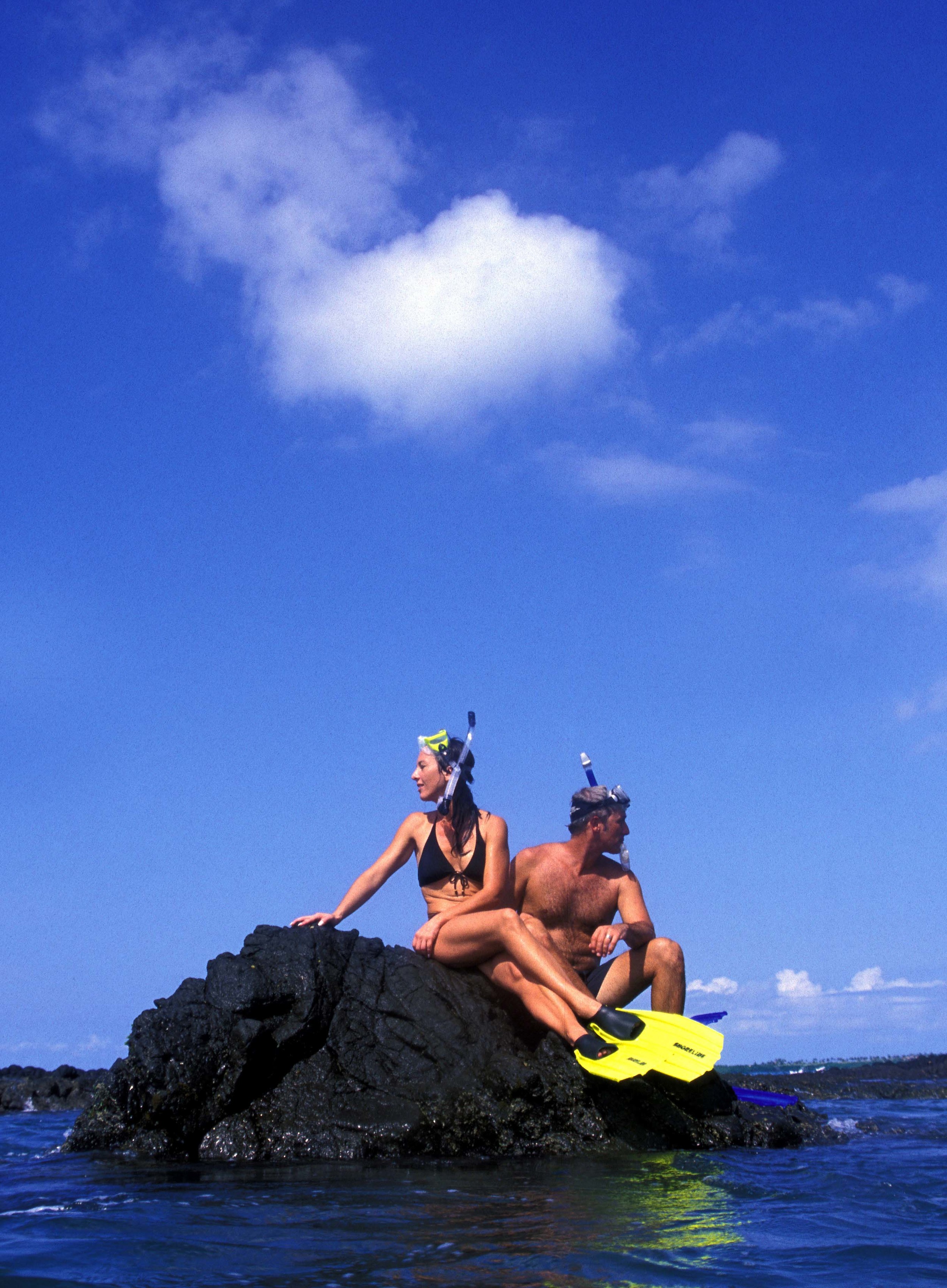 snorklers on rock.jpg