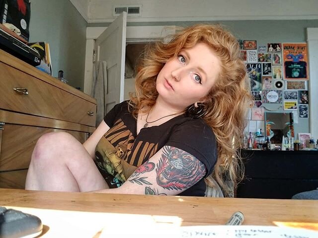 The lighting in my bedroom is really great, especially when it's eclipsed by a cat butt