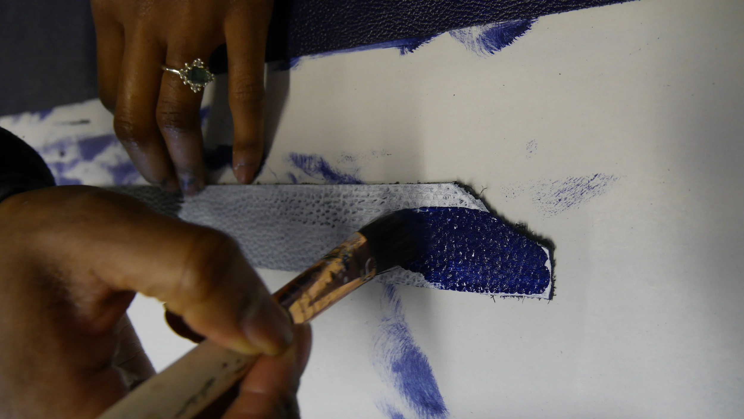 Applying the paint to the leather