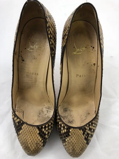 Before picture:worn Louboutin python leather
