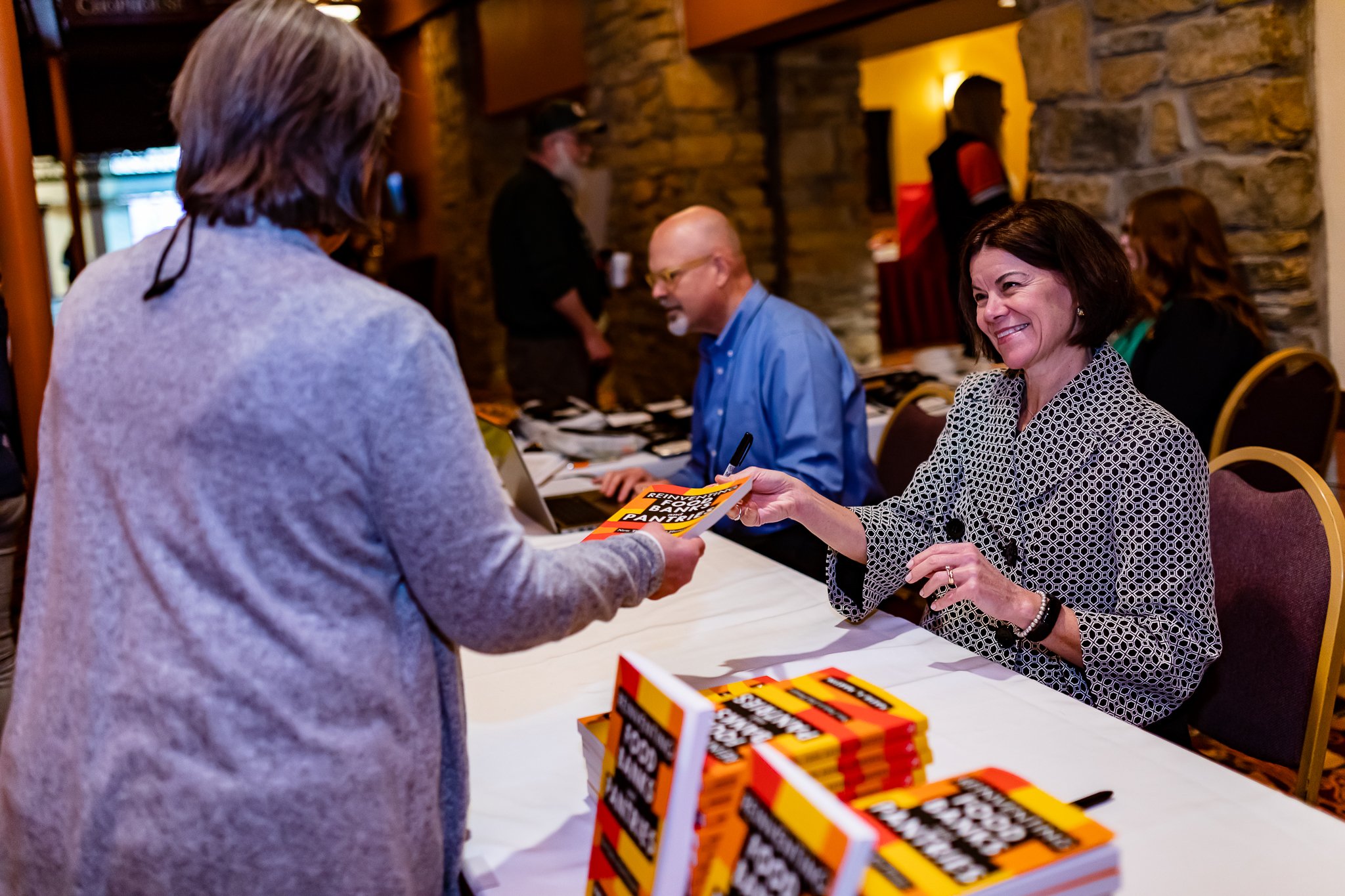 2022 Hunger and Health Summit KM book signing.jpg