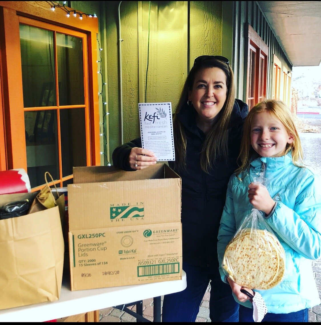 Sarah and Harper dropping off dinner to the local RMH.jpg
